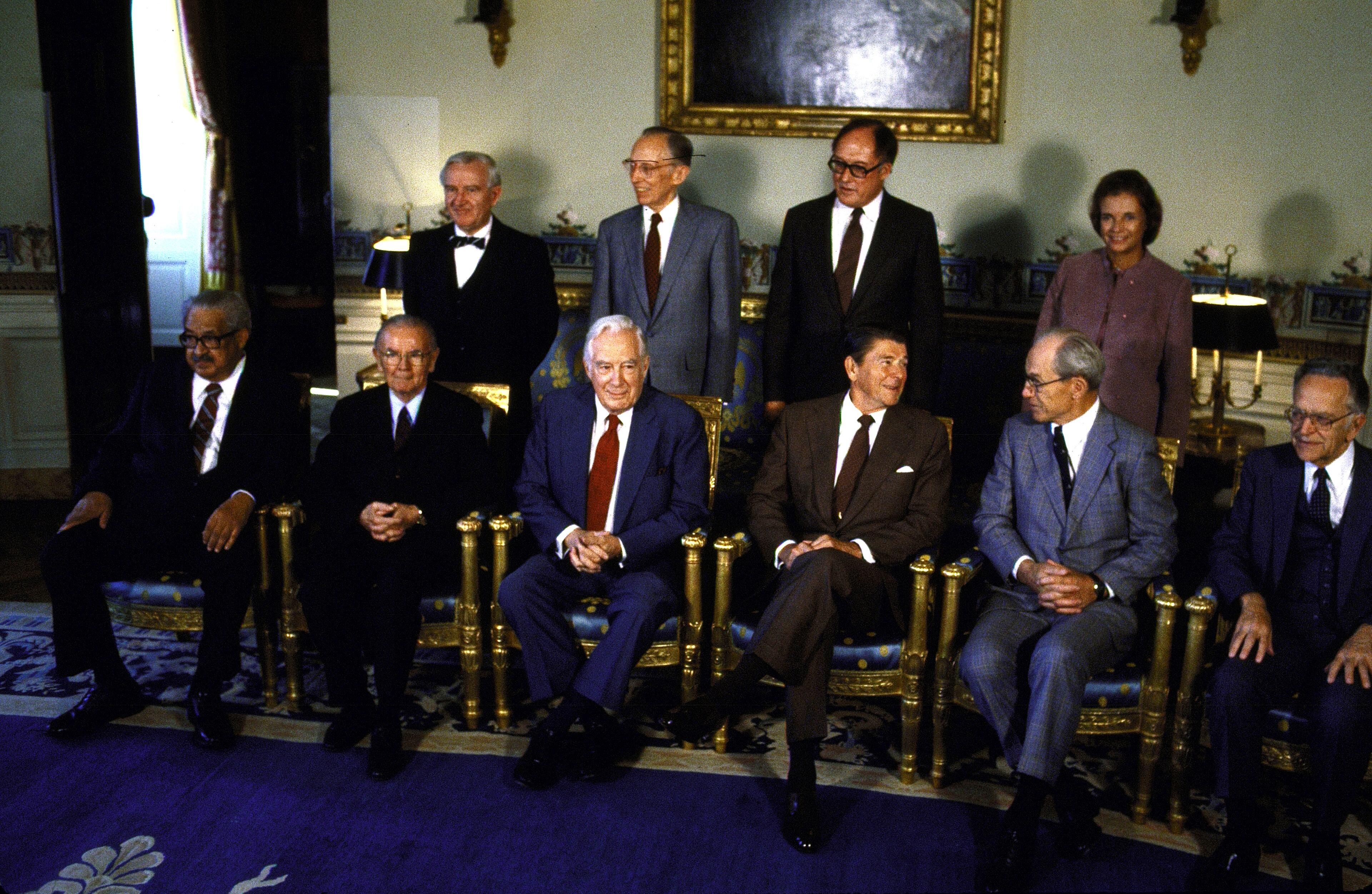 UNITED STATES - OCTOBER 01: President Ronald Reagan posing for portrait with Supreme Court Justices Blackmun, Brennan, Burger, Marshall, O'Connor, Powell, Rehnquist, Stevens & White. (Photo by Diana Walker/The LIFE Images Collection via Getty Images)