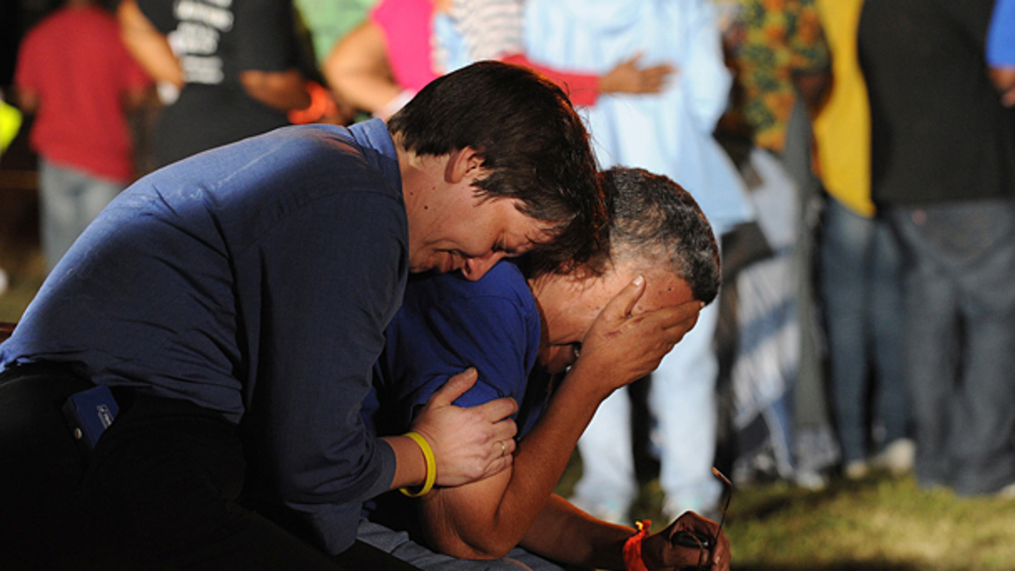 The Rev.Lynn Hopkins hugs Carolyn Bond at Georgia Diagnostic and Classification Prison moments after it was announced that Troy Anthony Davis had been executed on Wednesday, Sept 21,2011.