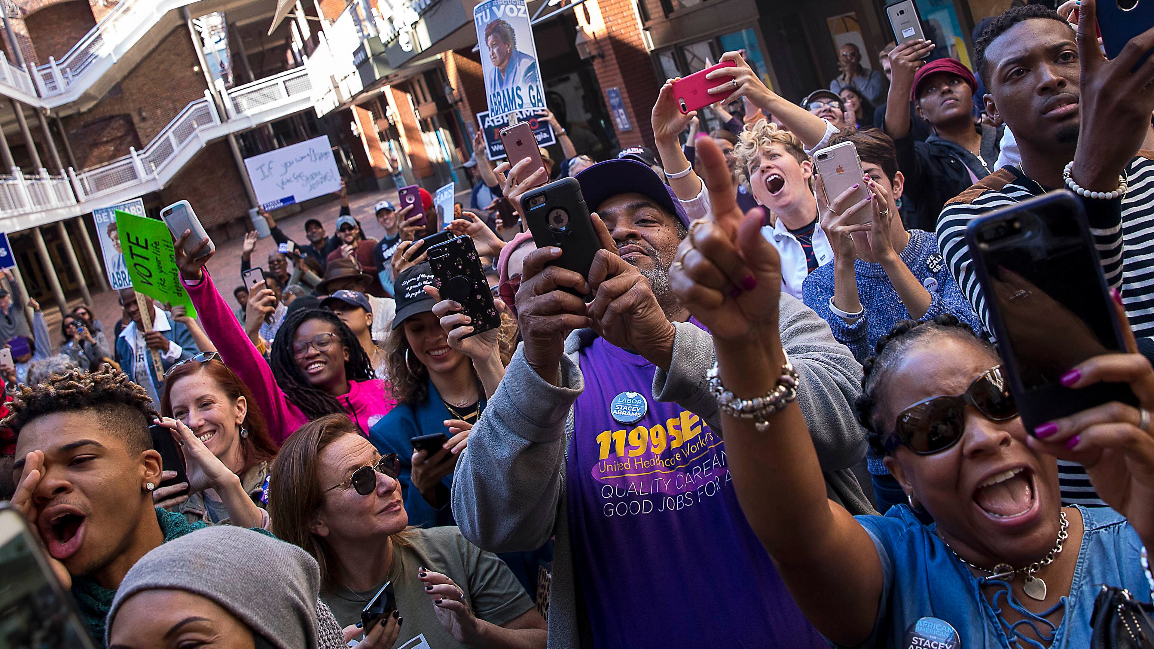 Young supporters of Democratic Stacey at a during the 2018 race for governor in Georgia. ALYSSA POINTER/ALYSSA.POINTER@AJC.COM