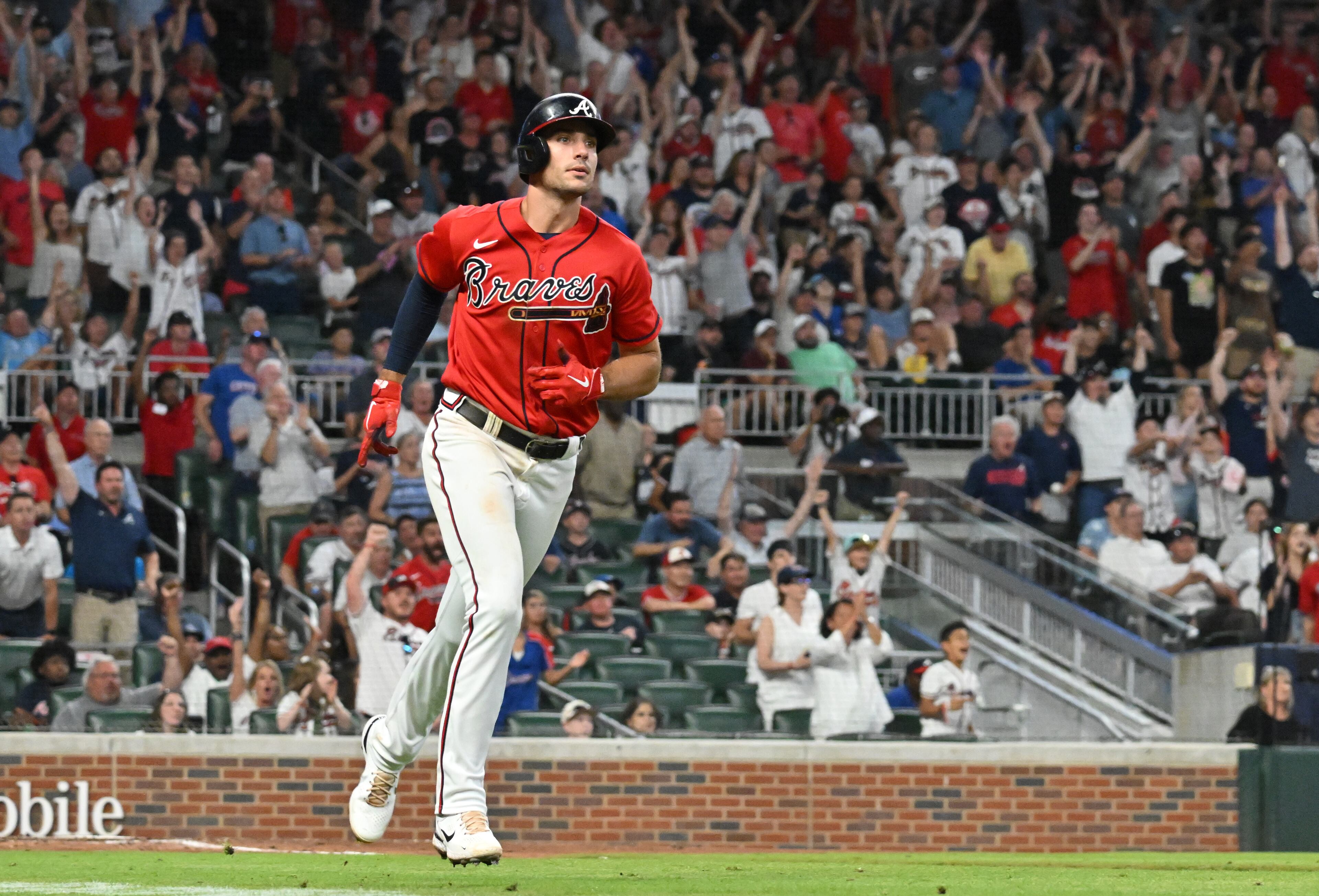 Braves' first baseman Matt Olson (28) hits a two-run home run in the 7th inning at Truist Park on Friday, July 22, 2022. The Atlanta Braves won 8-1 over the Los Angeles Angels. (Hyosub Shin / Hyosub.Shin@ajc.com)
