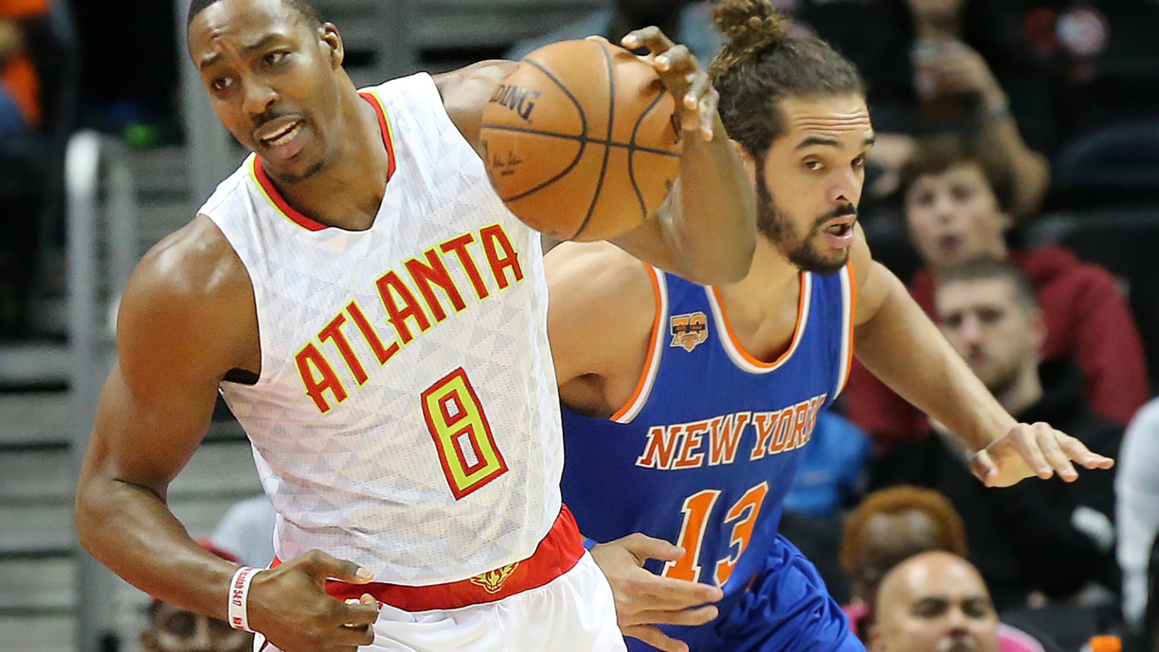 Hawks center Dwight Howard steals from Knicks Joakim Noach in a NBA basketball game on Wednesday, Dec. 28, 2016, in Atlanta. Curtis Compton/ccompton@ajc.com