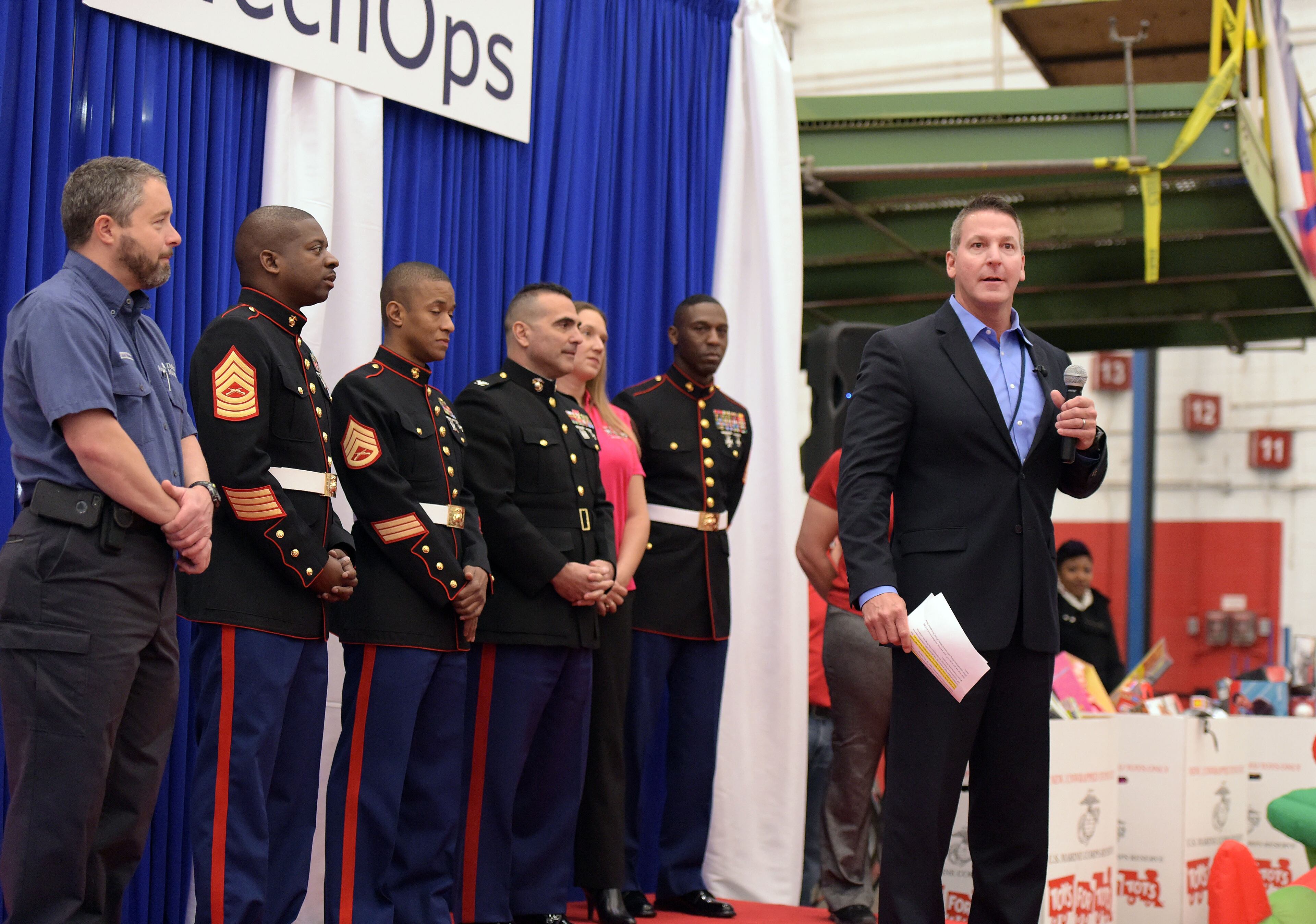 DECEMBER 4, 2015 ATLANTA Mike Moore, VP of Engine and Component Maintenance, gives remarks during the program. Technicians at Delta's TechOps maintenance operation donated nearly 700 bikes (with helmets) to Marine Corps representatives Friday, December 4, 2015. Marine Corps Col Matt Puglisi, Commanding Officer, Combat Logistics Regiment 45, accepted the bikes, that were donated and assembled by Delta technicians, who work in 21 different shops, each specializing in an area like avionics, wheels and brakes, engines and airframes. There were also 2,500 toys donated. This is the 11th year TechOps has donated bicycles and toys. KENT D. JOHNSON/ kdjohnson@ajc.com