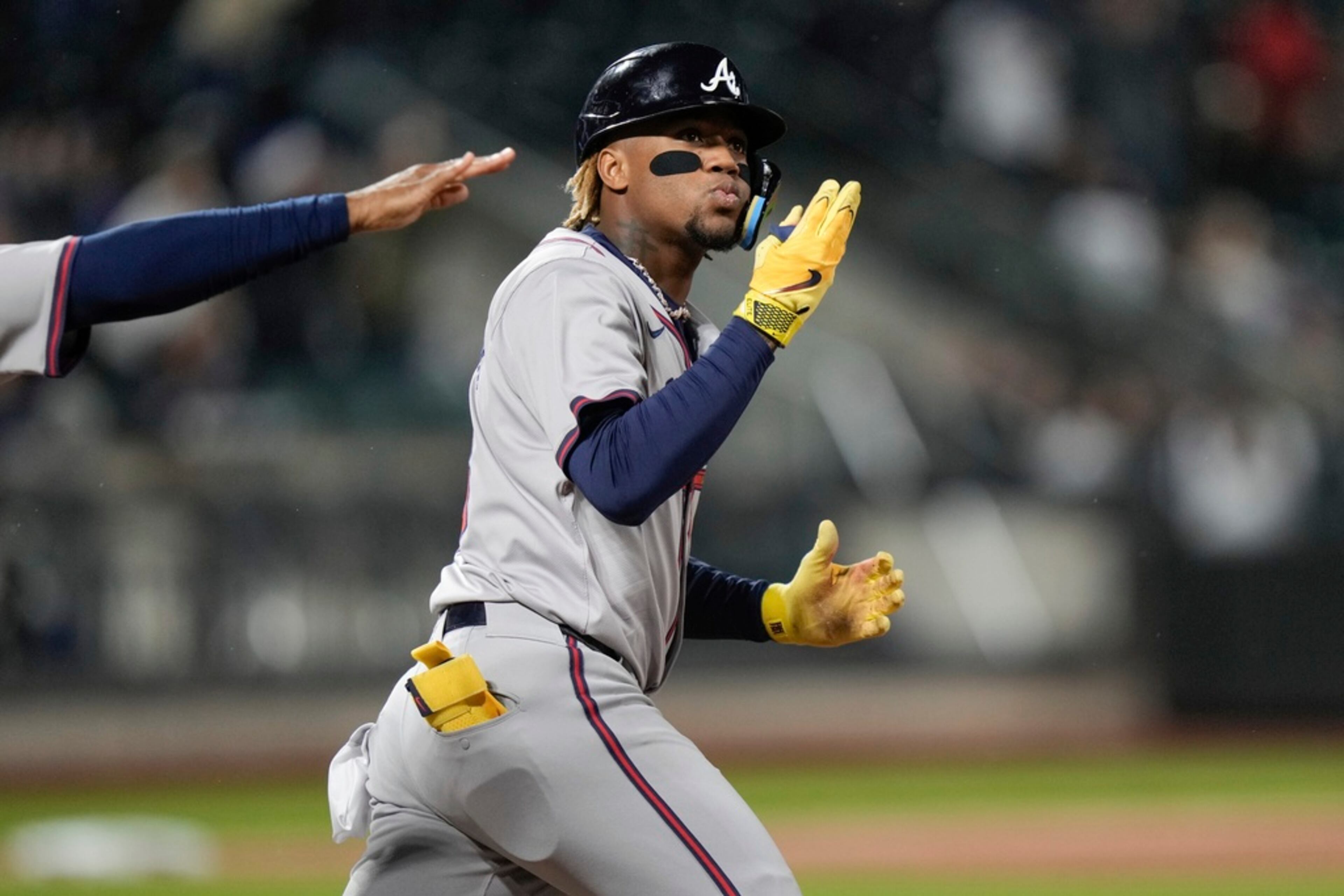 Atlanta Braves' Ronald Acuña Jr. gestures to fans as he runs the bases after hitting a home run against the New York Mets during the third inning of a baseball game Friday, May 10, 2024, in New York. The Braves won 4-2. (AP Photo/Frank Franklin II)