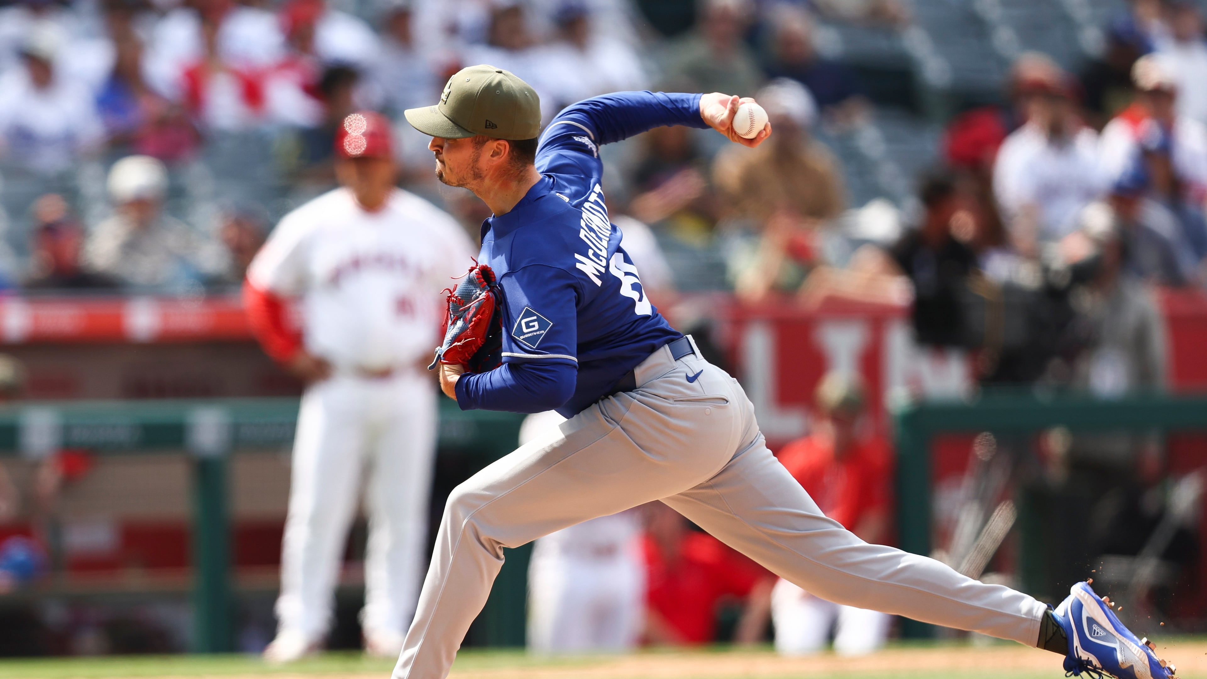 Los Angeles Dodgers pitcher Chayce McDermott throws to a Los Angeles Angels batter during the ninth inning of a baseball game, Sunday, May 17, 2026, in Anaheim, Calif. (AP Photo/Jessie Alcheh)