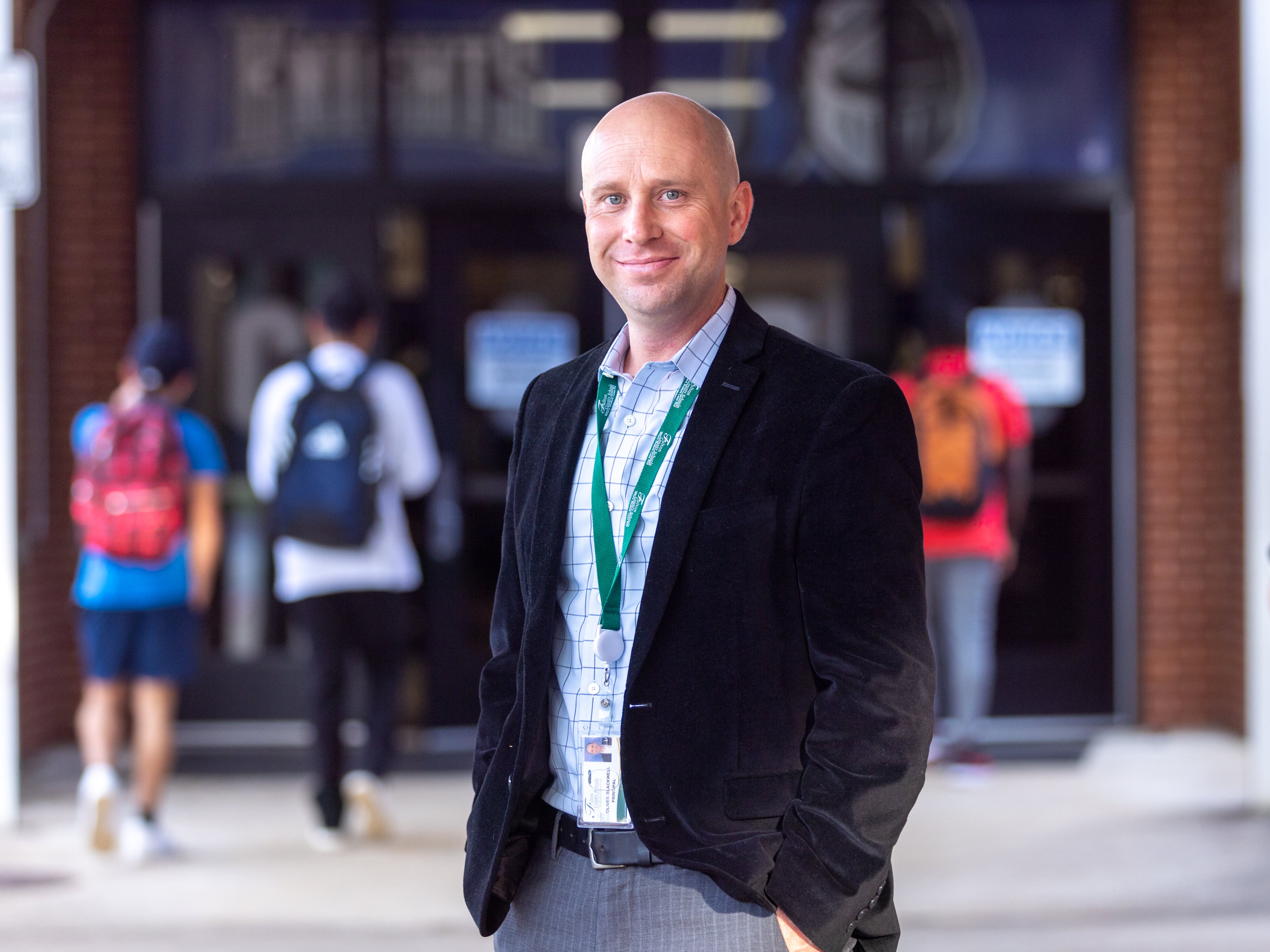 Principal Opie Blackwell poses for a portrait at Centennial High School in Roswell on Wednesday, August 9, 2023. (Arvin Temkar / arvin.temkar@ajc.com)