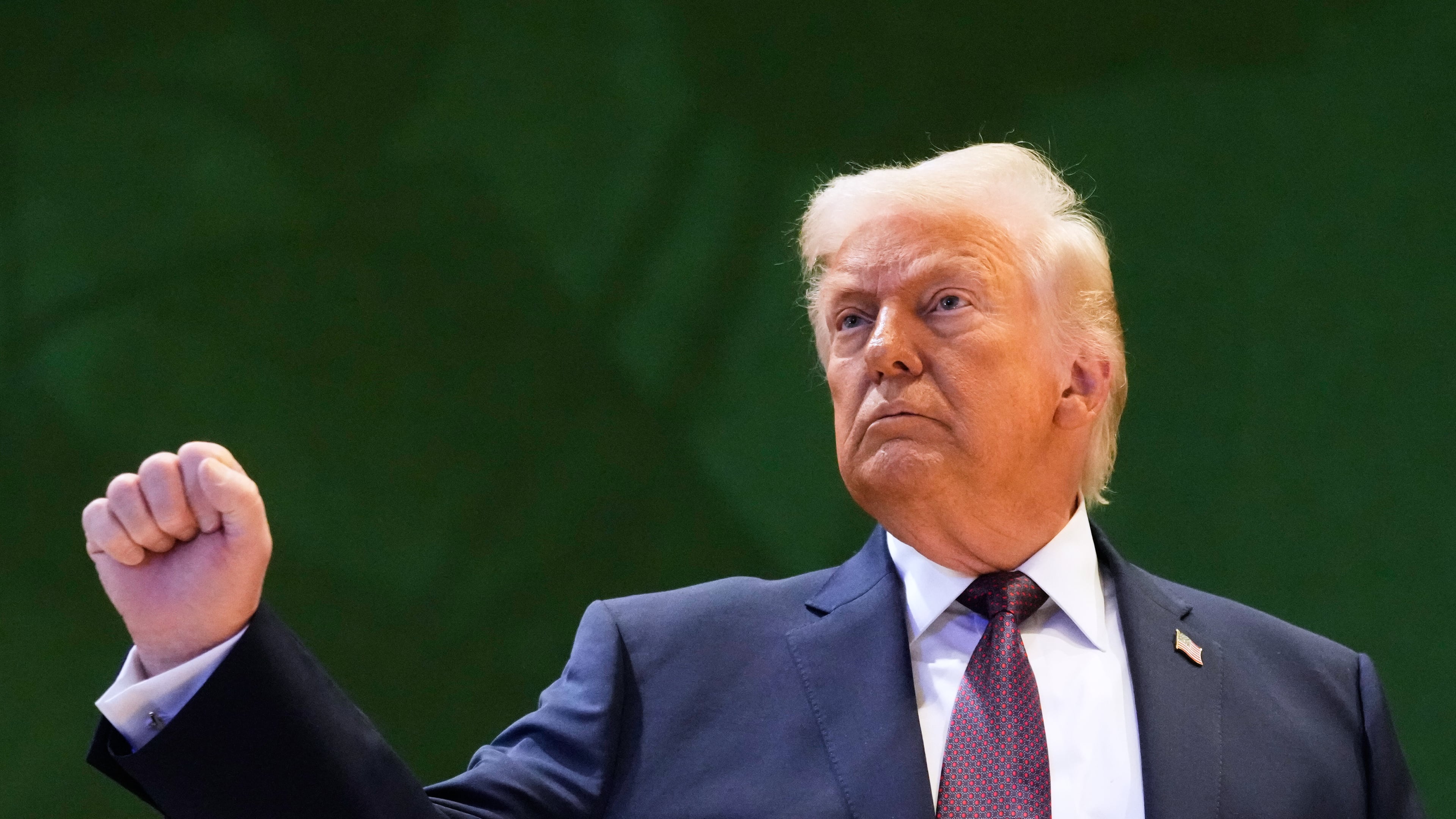 US President Donald Trump leaves after a signing ceremony of his Board of Peace initiative at the Annual Meeting of the World Economic Forum in Davos, Switzerland, Thursday, Jan. 22, 2026. (AP Photo/Markus Schreiber)