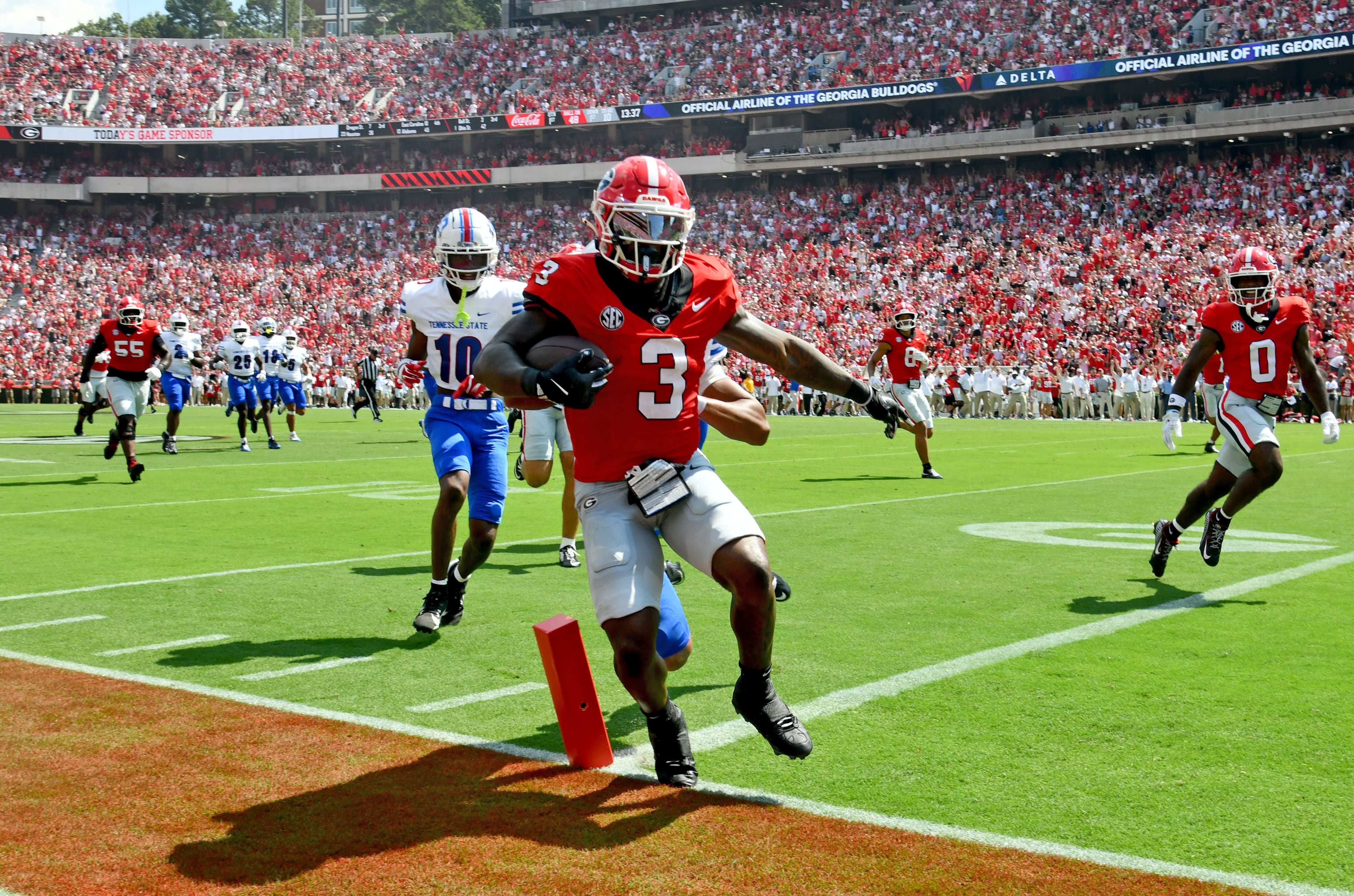 Georgia running back Nate Frazier scores a touchdown during the first half in an NCAA football game against Tennessee State at Sanford Stadium on Saturday, Sept. 5, 2026, in Athens, Ga. (Hyosub Shin/AJC)