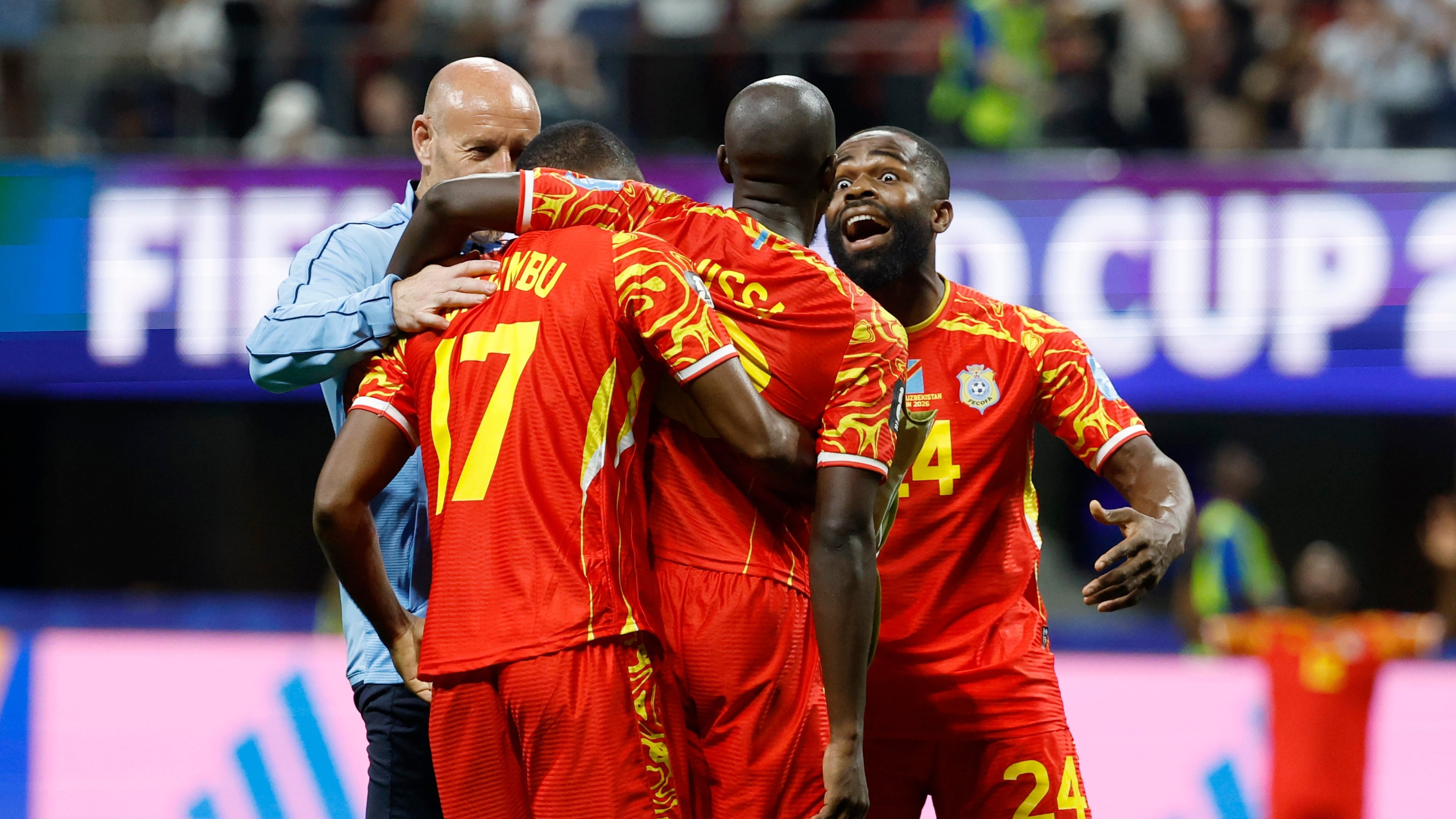 Congo's Cedric Bakambu (17), Yoane Wissa (20) and Gedeon Kalulu (24) celebrate a win during the World Cup Group K soccer match between DR Congo and Uzbekistan in Atlanta, Saturday, June 27, 2026. (AP Photo/Erik S. Lesser)