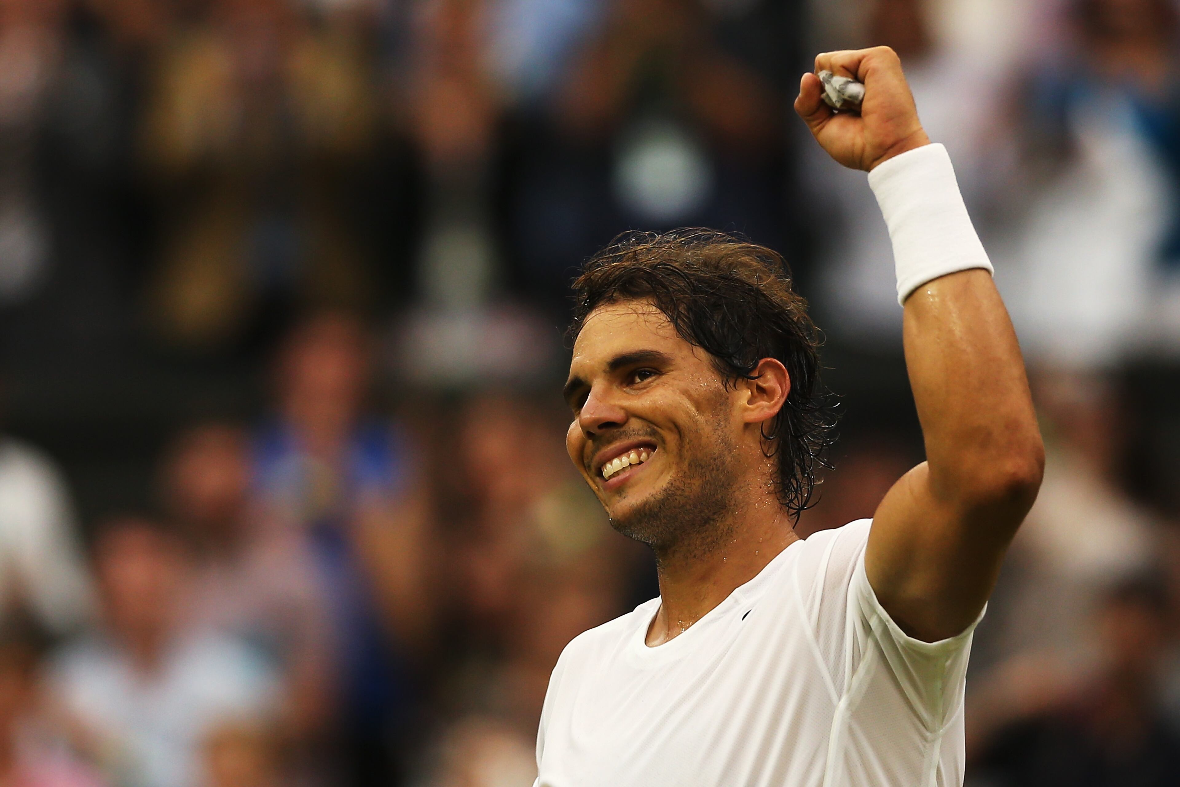 Rafael Nadal of Spain celebrates after winning his Gentlemen's Singles third round match against Mikhail Kukushkin of Kazakhstan on day six of the Wimbledon Lawn Tennis Championships at the All England Lawn Tennis and Croquet Club at Wimbledon on June 28, 2014 in London, England. (Photo by Matthew Stockman/Getty Images)