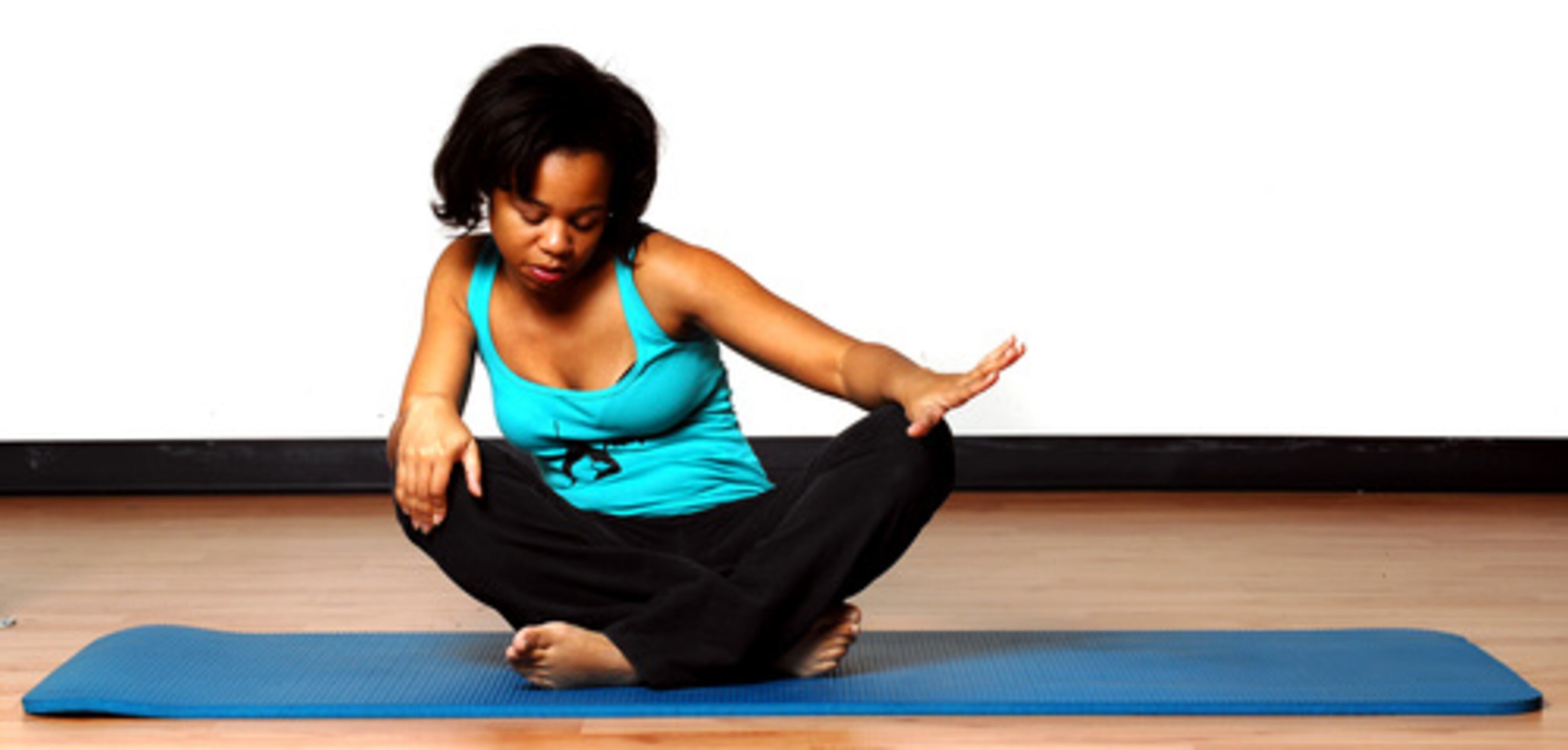 SITTING SPINE CIRCLES (2) Round your back (holding in your belly) and extend arms almost straight. Continue moving torso to the left and back to center. Inhale when forward; exhale when back.