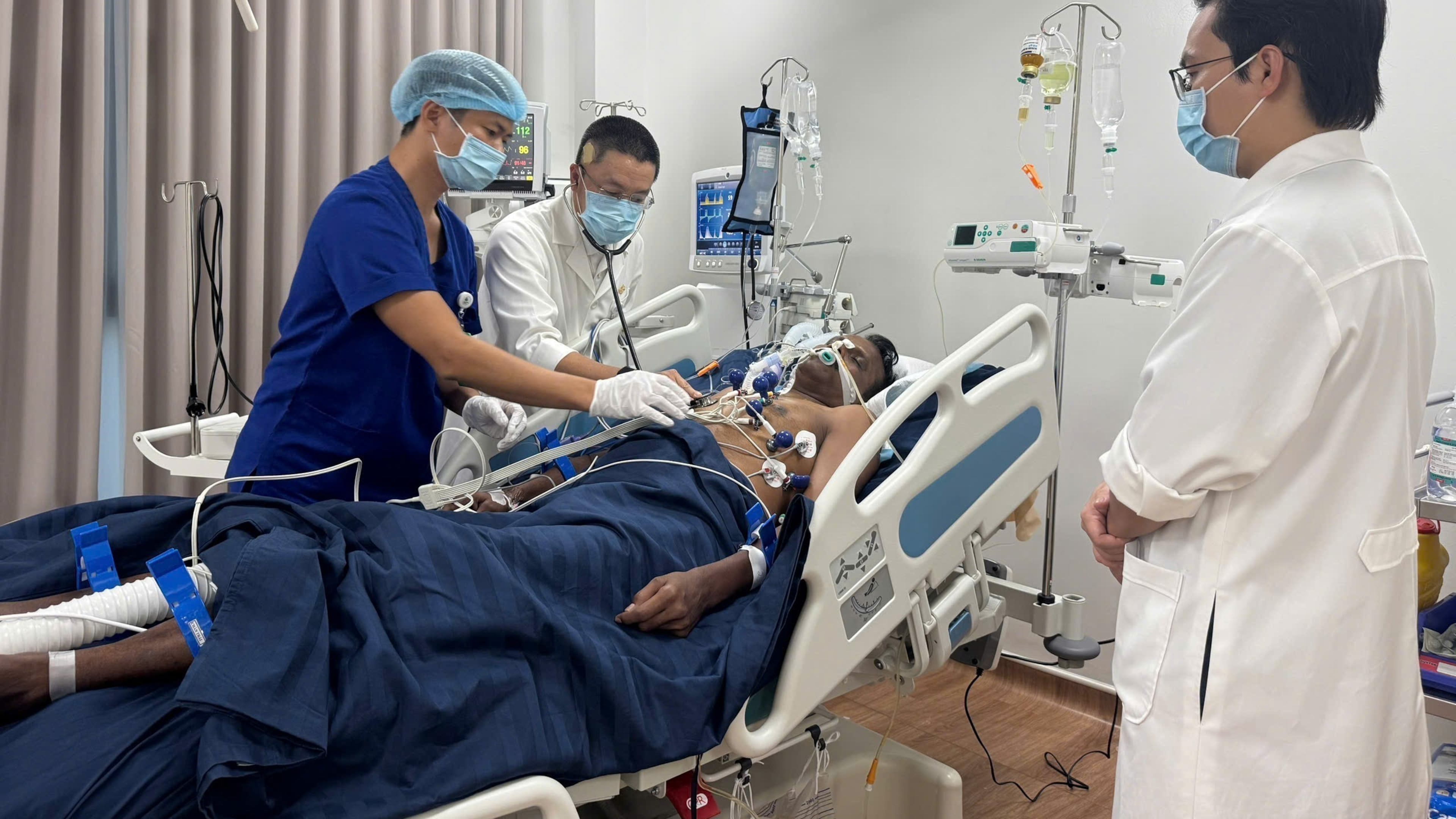 An Indian tourist, who was rescued from a speedboat that capsized, receives treatment at a hospital in Phu Quoc, Vietnam, Saturday, July11, 2026. (Le Huy Hai/VNA via AP)