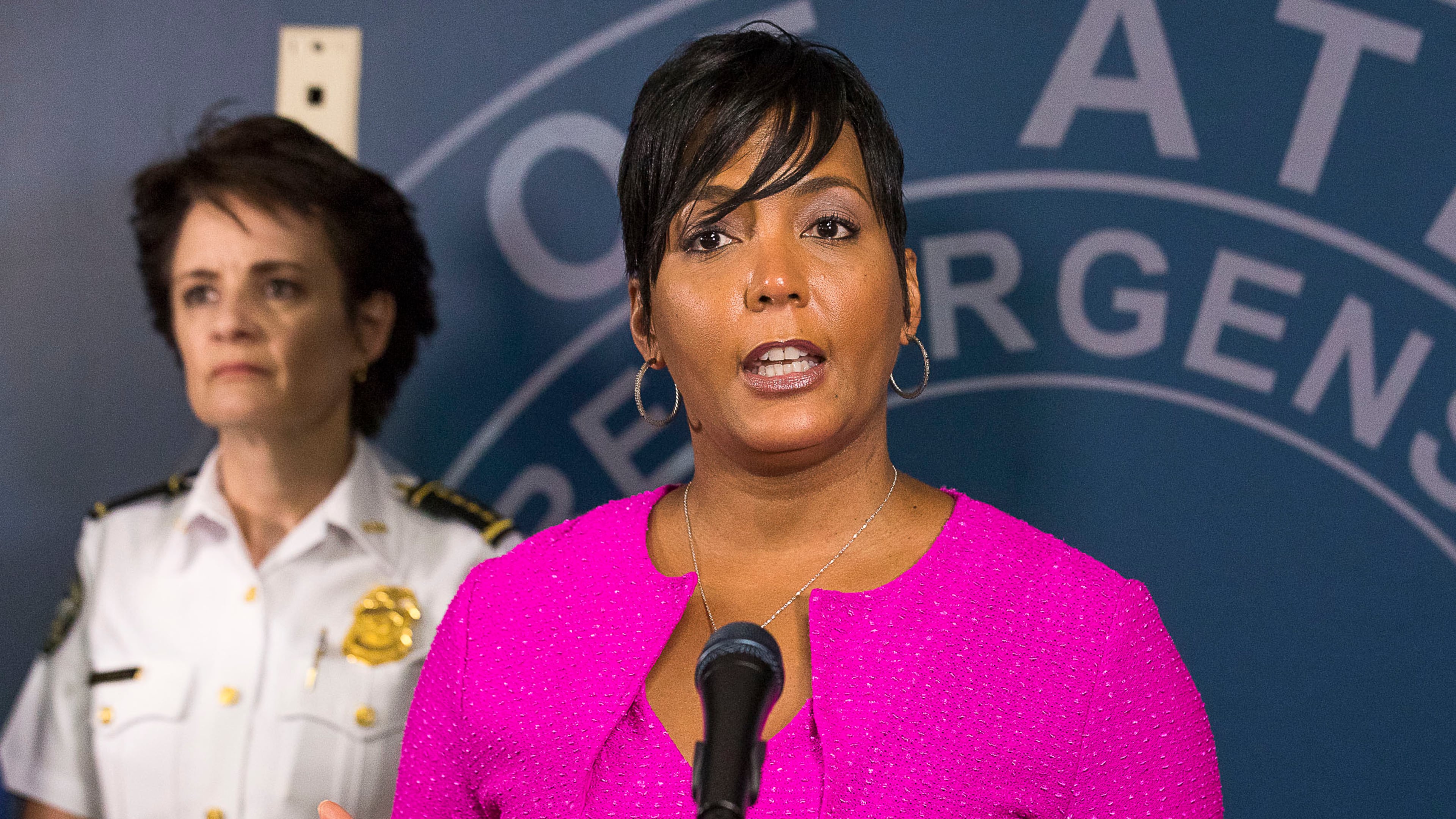 10/07/2019 — Atlanta, Georgia — Atlanta Police Chief Erika Shields (left) listens as Atlanta Mayor Keisha Lance Bottoms speaks during a presser at the Atlanta Public Safety Headquarters, Monday, October 7, 2019. (Alyssa Pointer/Atlanta Journal Constitution)