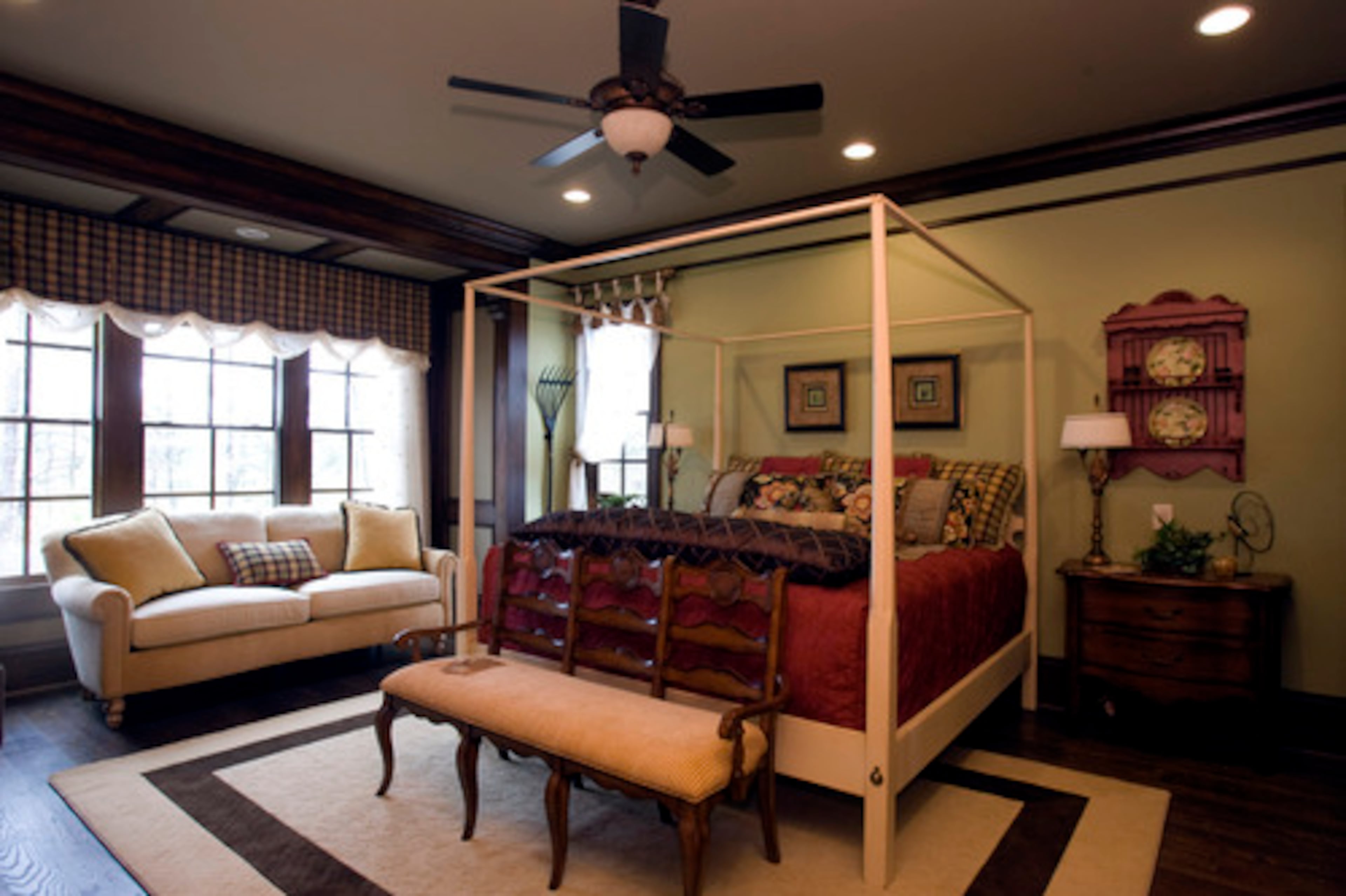 House 2: The master bedroom in Heritage Hall was designed by Laura Bloom of Home Expressions Interiors.