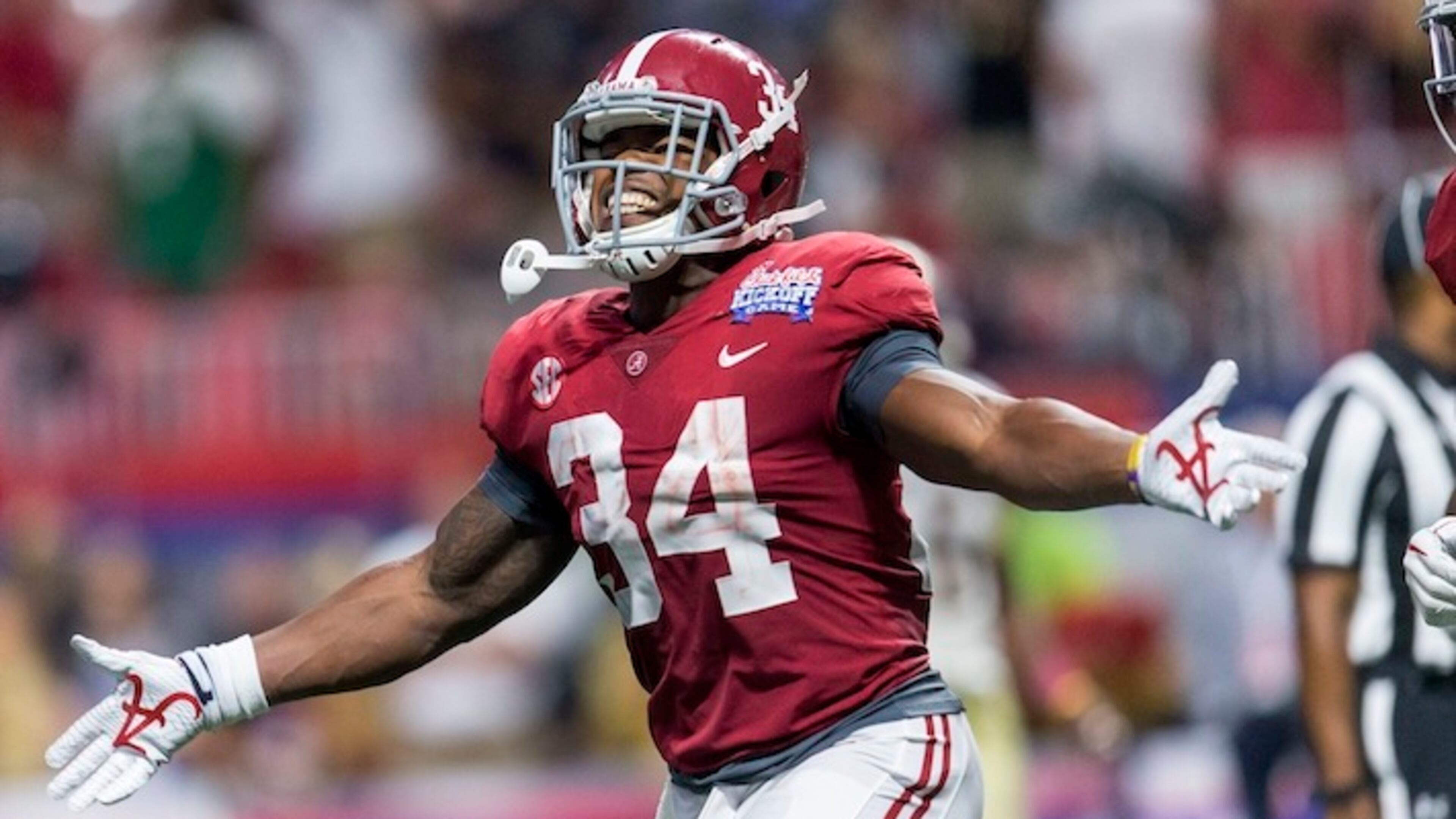 Alabama running back Damien Harris (34) celebrates his touchdown with the fans during the second half of the Alabama vs. Florida State football game, Saturday, Sept. 2, 2017, at Mercedes-Benz Stadium in Atlanta.
(AP Photo/Alabama Media Group, Vasha Hunt)