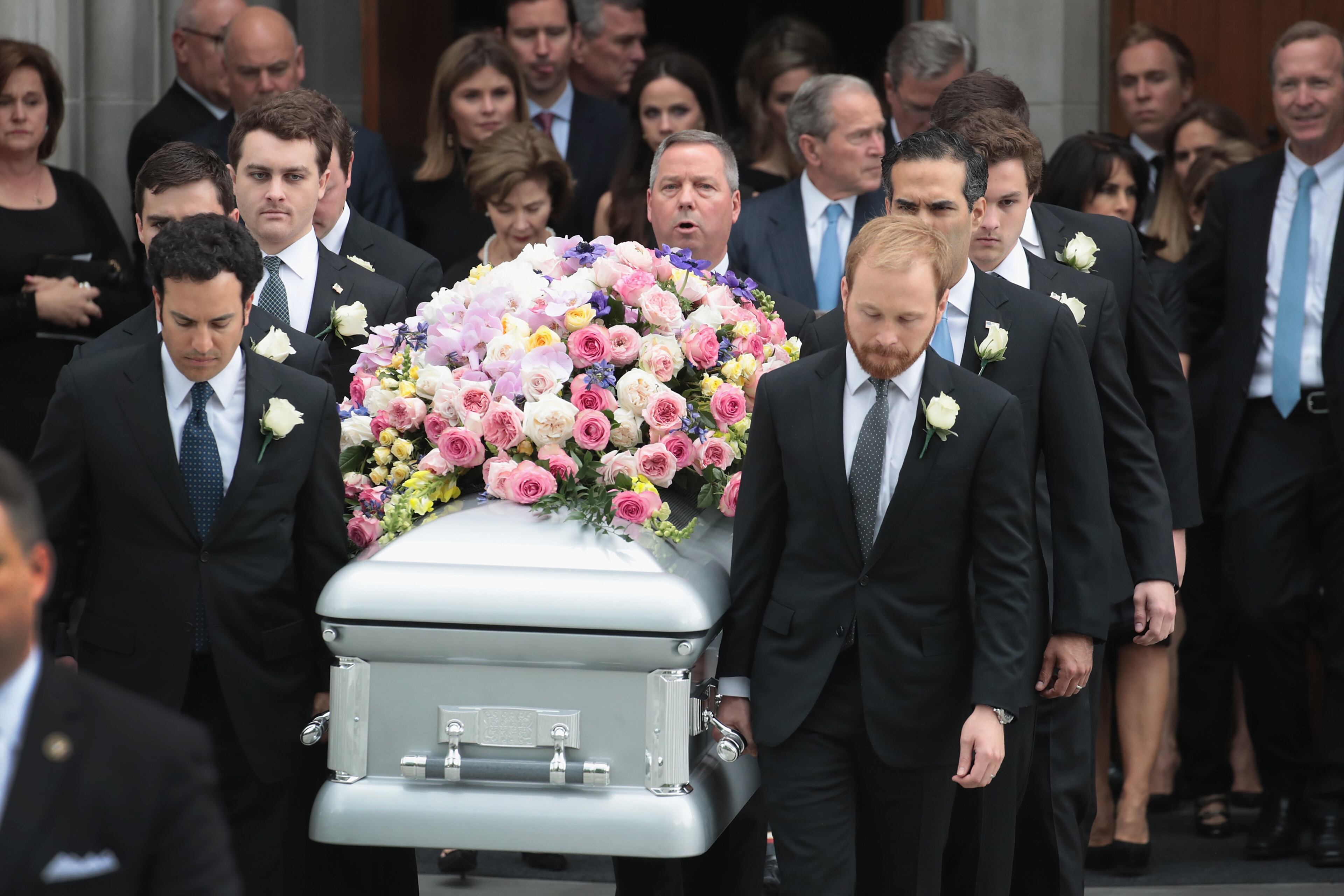 HOUSTON, TX - APRIL 21: The coffin of former first lady Barbara Bush is carried from St. Martin's Episcopal Church following her funeral service on April 21, 2018 in Houston, Texas. Bush, wife of former president George H. W. Bush and mother of former president George W. Bush, died at her home in Houston on April 17 at the age of 92. (Photo by Scott Olson/Getty Images)