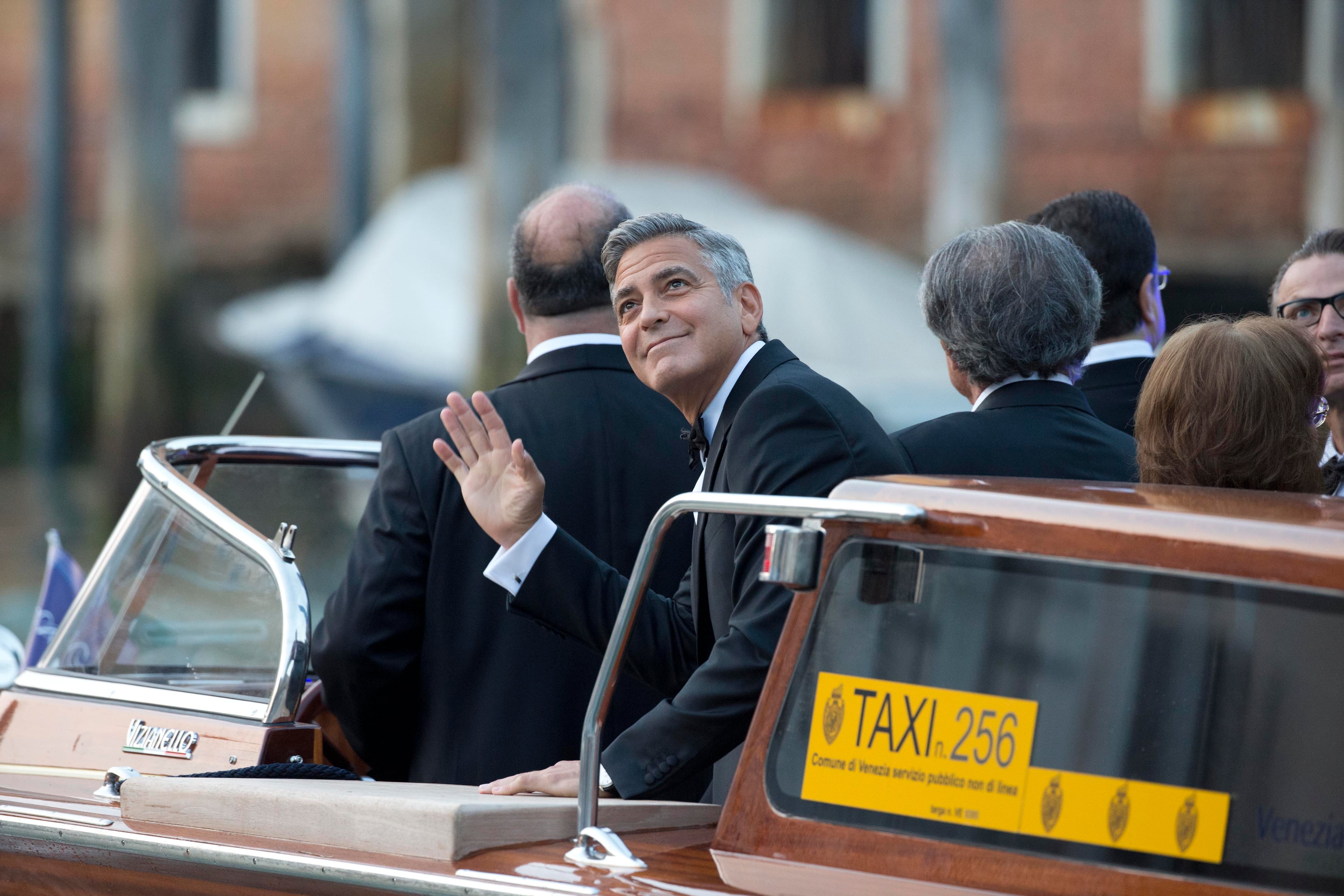 George Clooney on his way to marry Amal Alamuddin, in Venice, Italy, Saturday, Sept. 27, 2014. (AP Photo/Andrew Medichini)