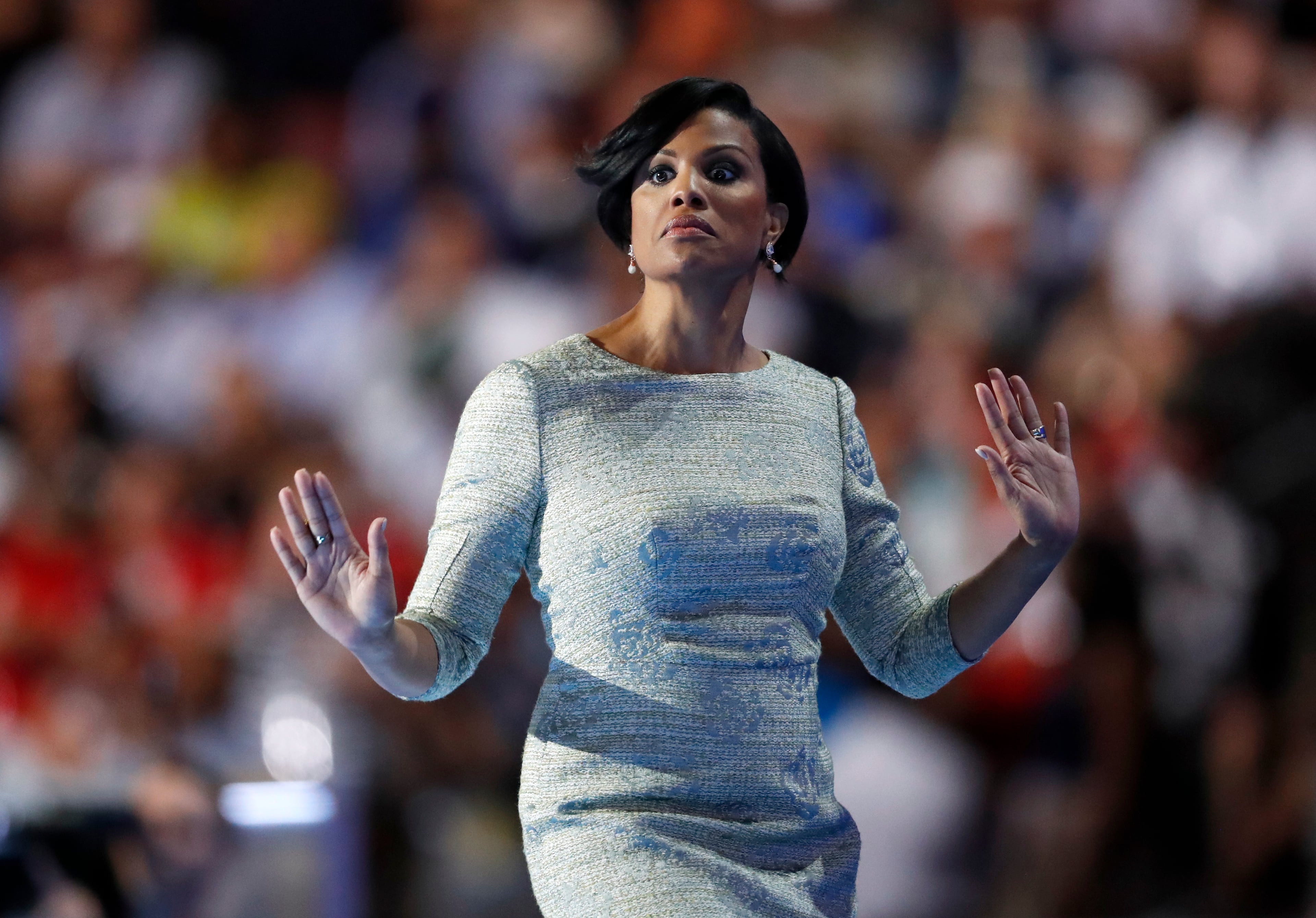 Baltimore mayor Stephanie Rawlings-Blake raises her hands before heading back to the podium to use the gavel to call the convention to order during the first day of the Democratic National Convention in Philadelphia , Monday, July 25, 2016. (AP Photo/Paul Sancya)