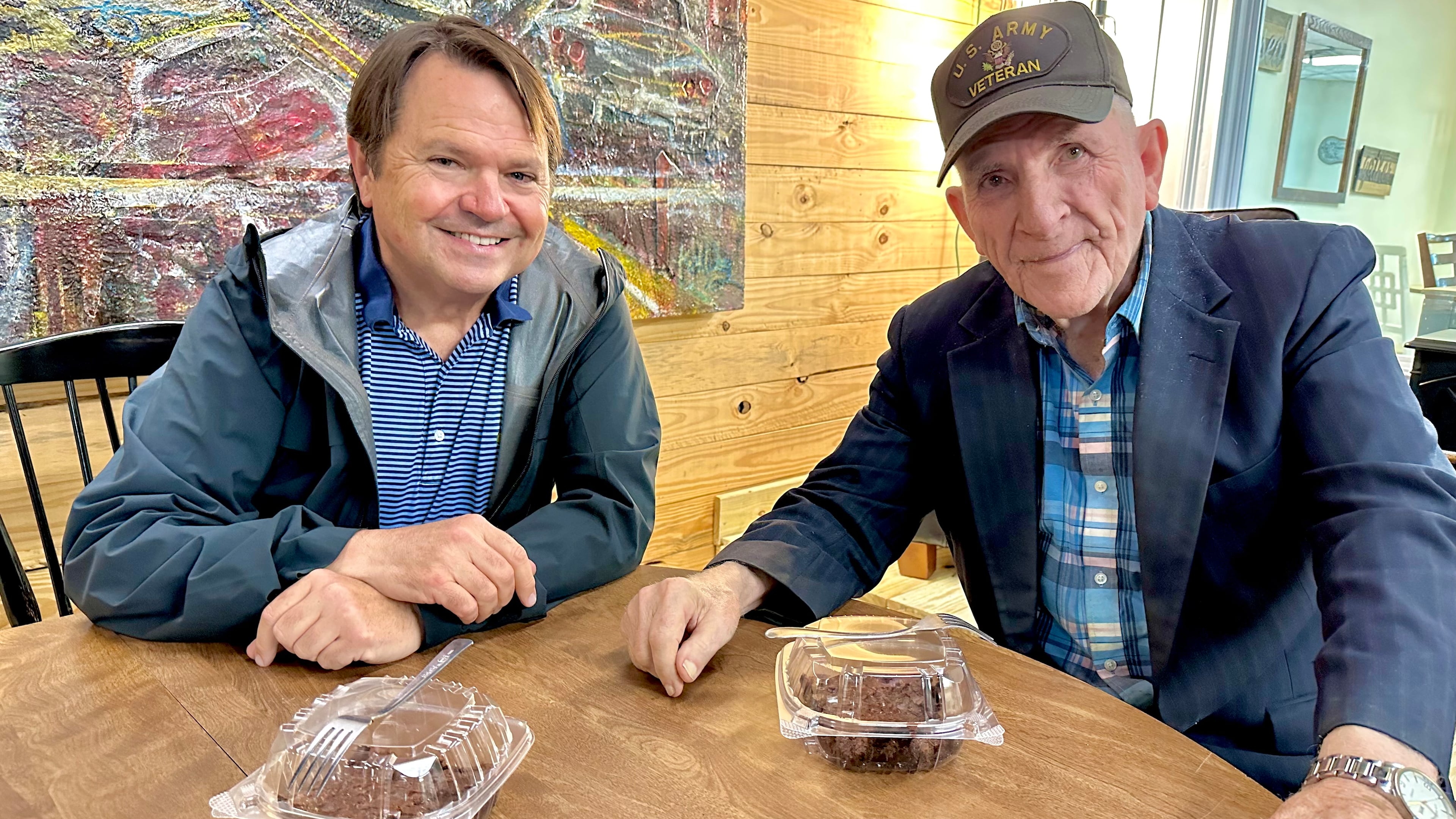 McCracken Poston (left) and Alvin Ridley earlier this year in a Ringgold coffee shop that once housed Ridley's TV repair business. Poston and Ridley formed a friendship 25 years ago when Poston successfully defended Ridley on a murder charge.