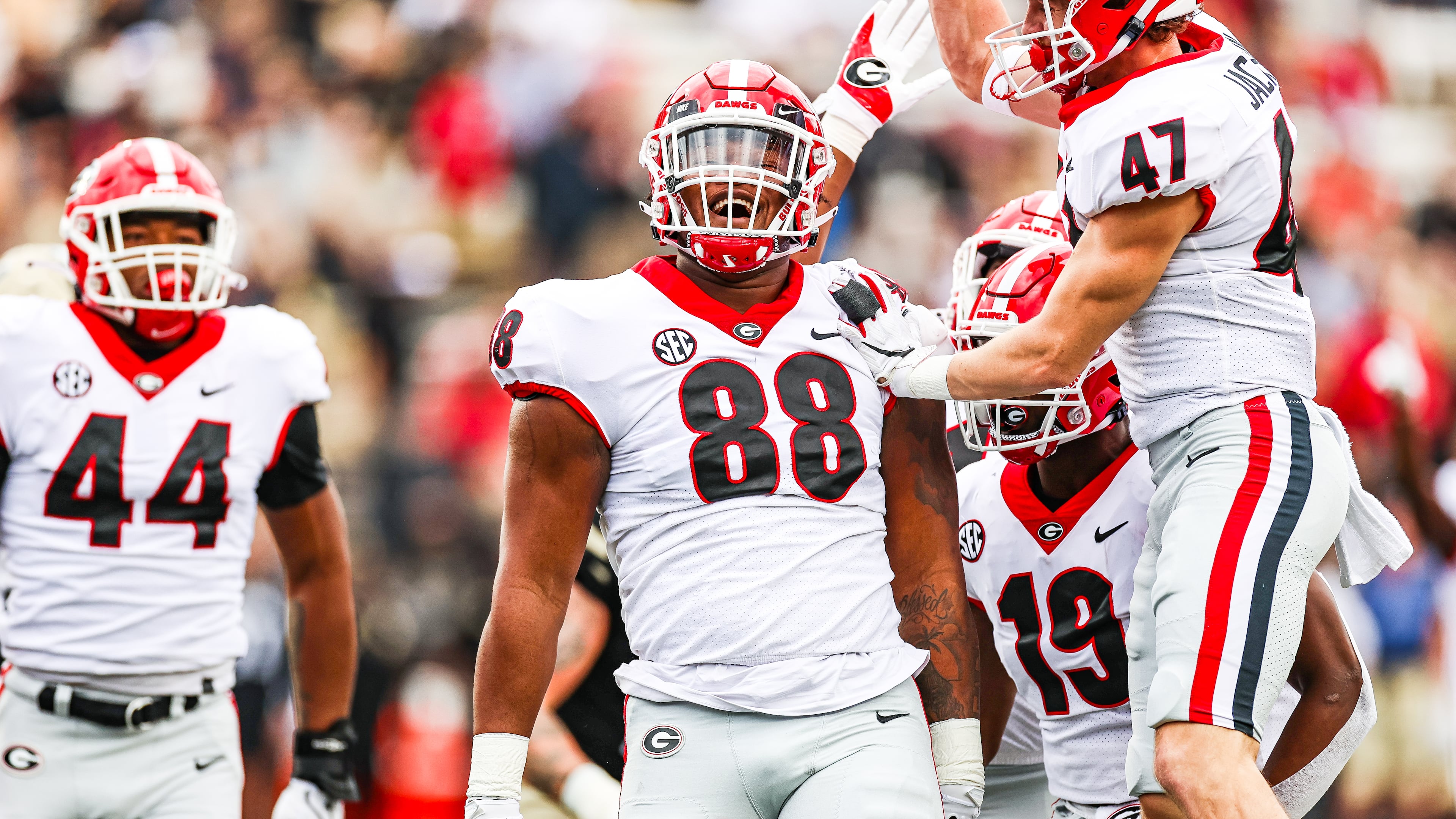 The defending national champion Georgia Bulldogs placed three players on the Walter Camp preseason All-American list released late Monday. Tight end Brock Bowers, defensive tackle Jalen Carter (88) and cornerback Kelee Ringo each received first-team All-American mention. (Photo by Tony Walsh)