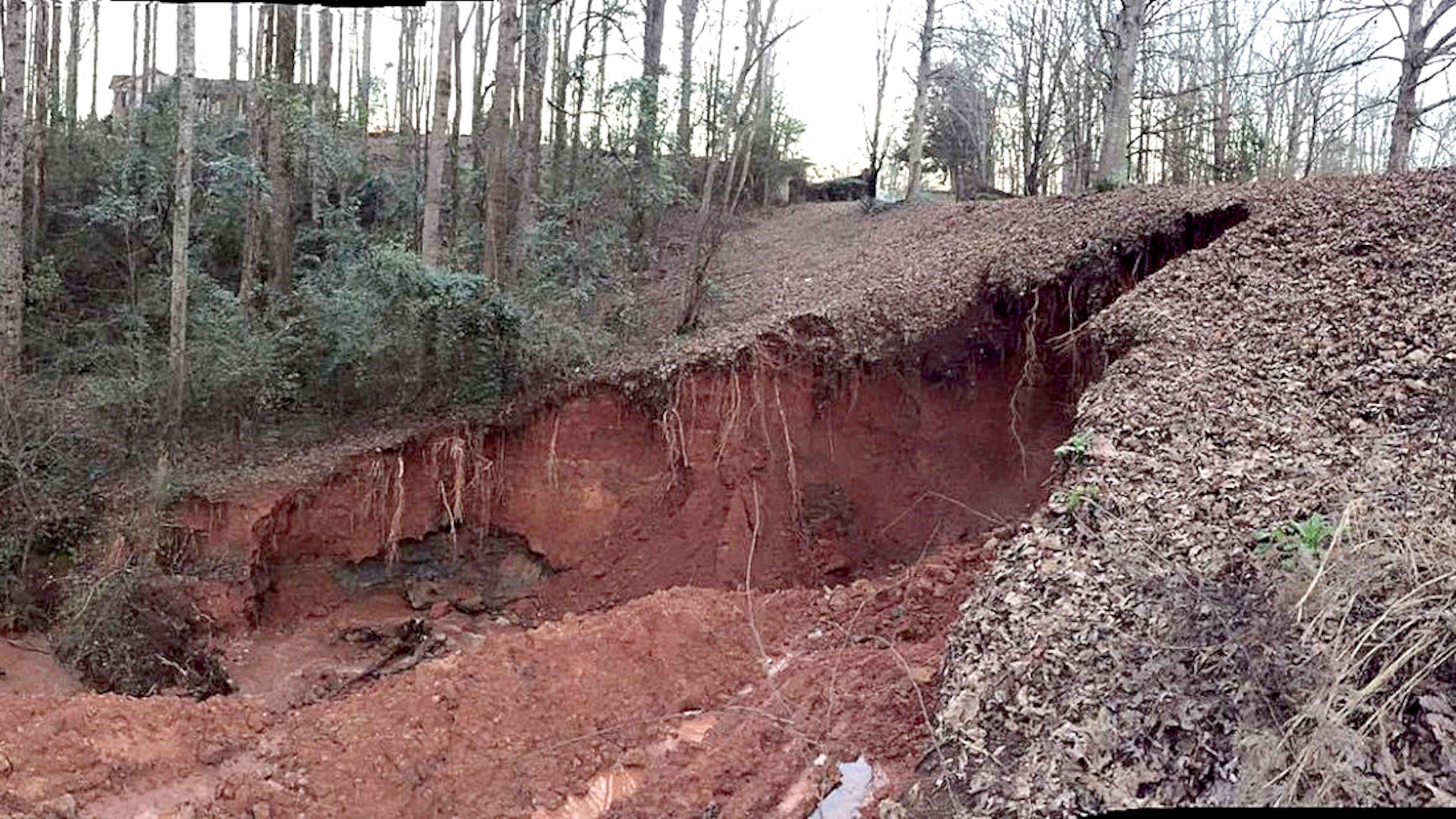 The dam in the Briar Lakes neighborhood was in danger of failing Tuesday night. (Photo: Oconee County Sheriff’s Office)