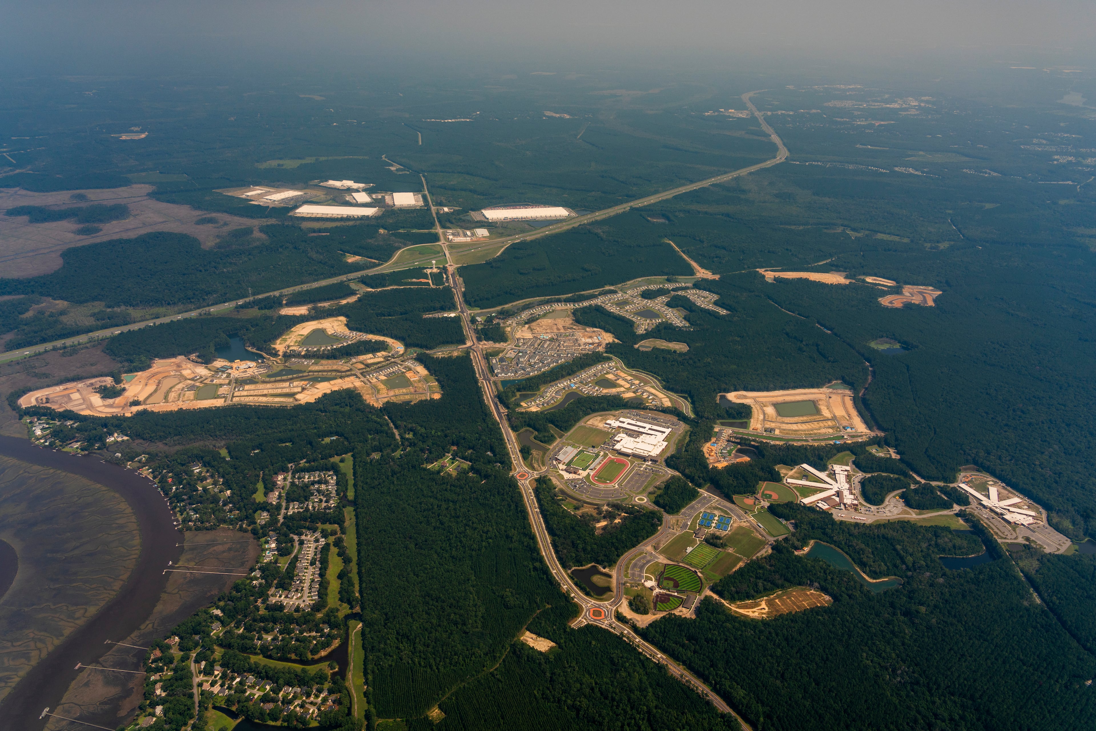 The initial phases of Heartwood at Richmond Hill include an industrial park, retail spaces near the I-95 interchange, a three-school campus and about 1,000 homes. Plans call for the addition of 9,000 more homes and expanded retail, including a supermarket and home improvement store, over the next two decades. (Photo courtesy of Raydient)