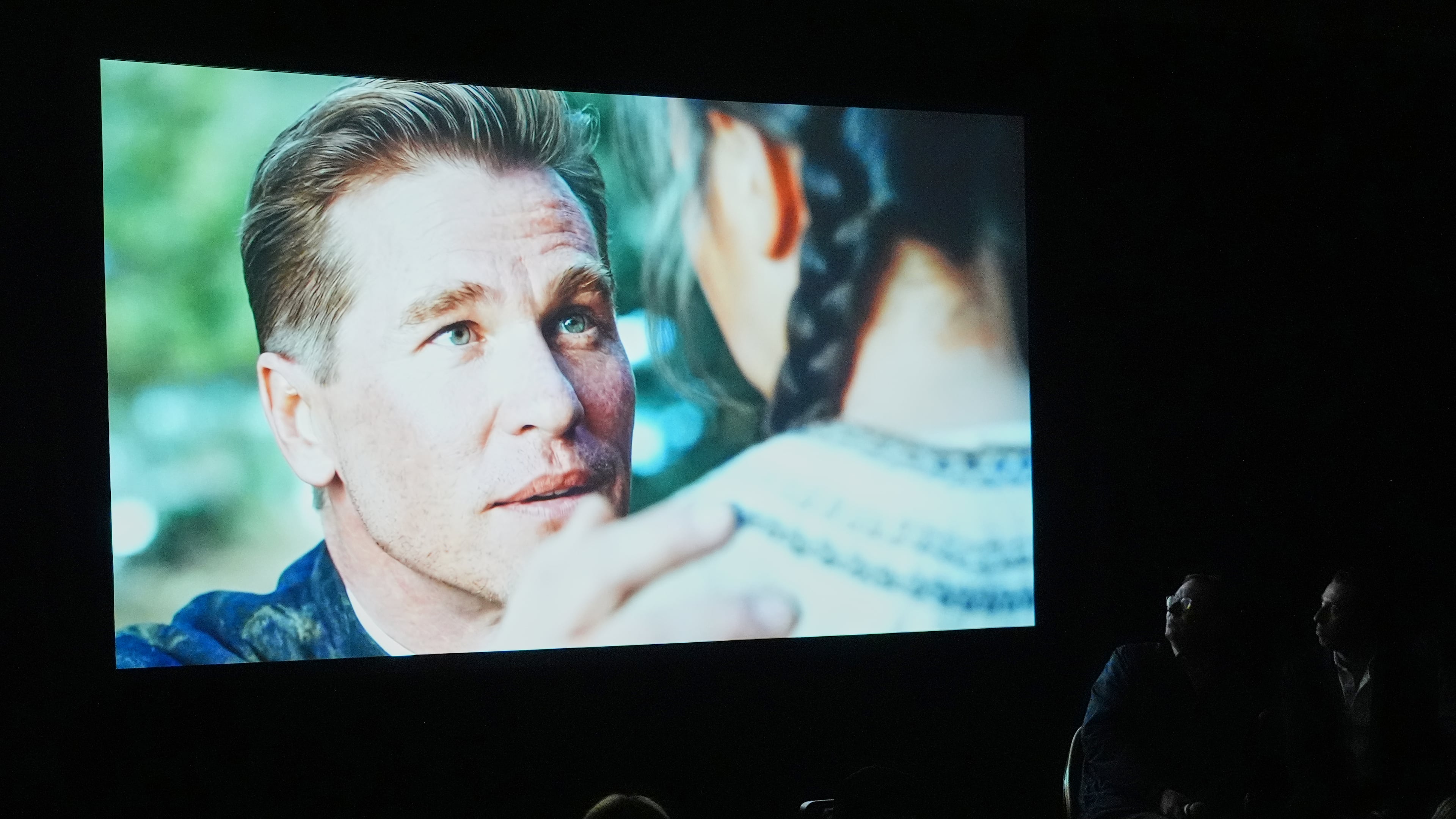 People watch a trailer for the upcoming film “As Deep as the Grave” featuring a character played by a generative AI version of Val Kilmer at CinemaCon on Wednesday, April 15, 2026, at Caesars Palace in Las Vegas. (AP Photo/Chris Pizzello)