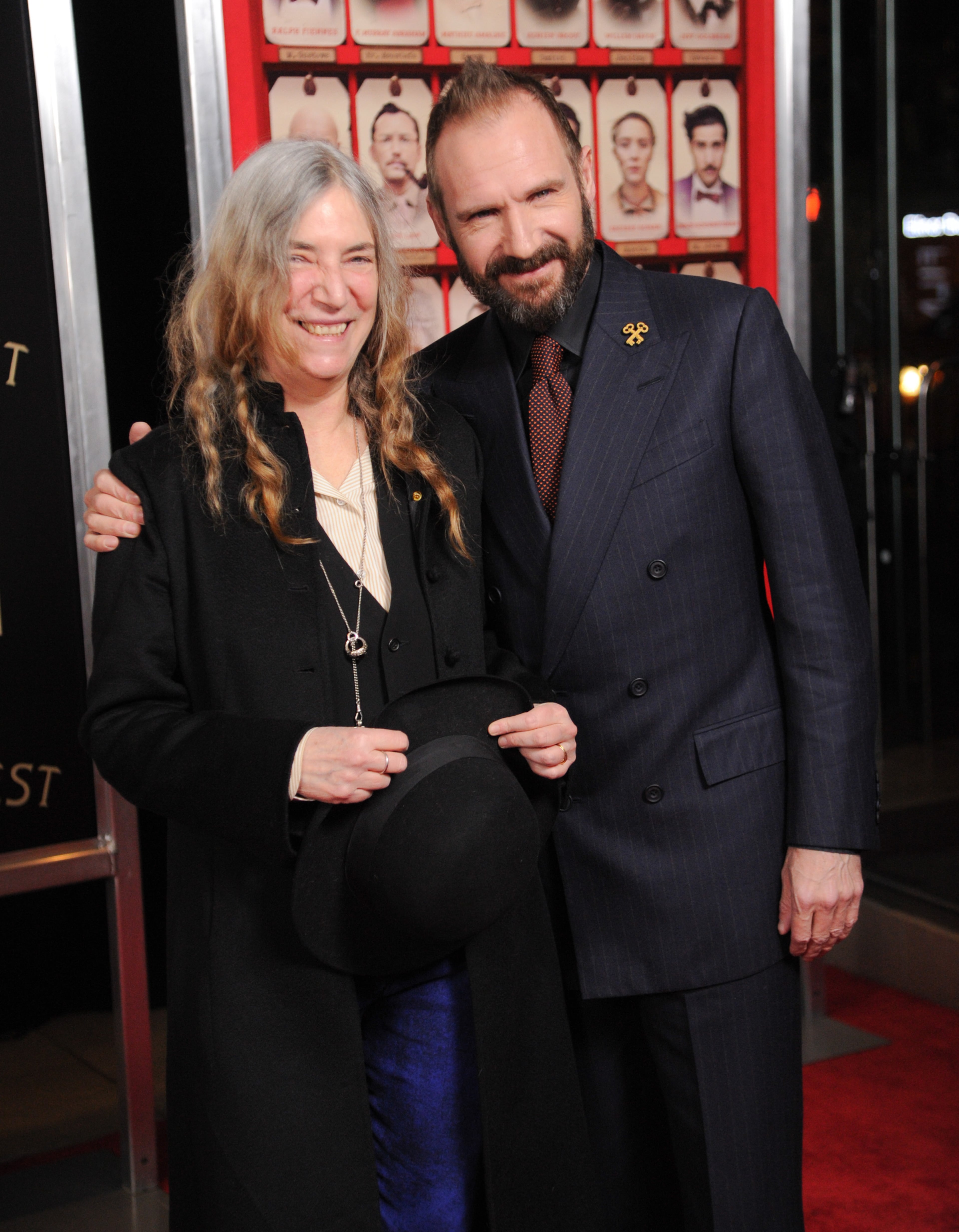 Singer Patti Smith, left, and actor Ralph Fiennes attend the premiere of Fox Searchlight Pictures' "The Grand Budapest Hotel" at Alice Tully Hall on Wednesday, Feb. 26, 2014, in New York. (Photo by Evan Agostini/Invision/AP)