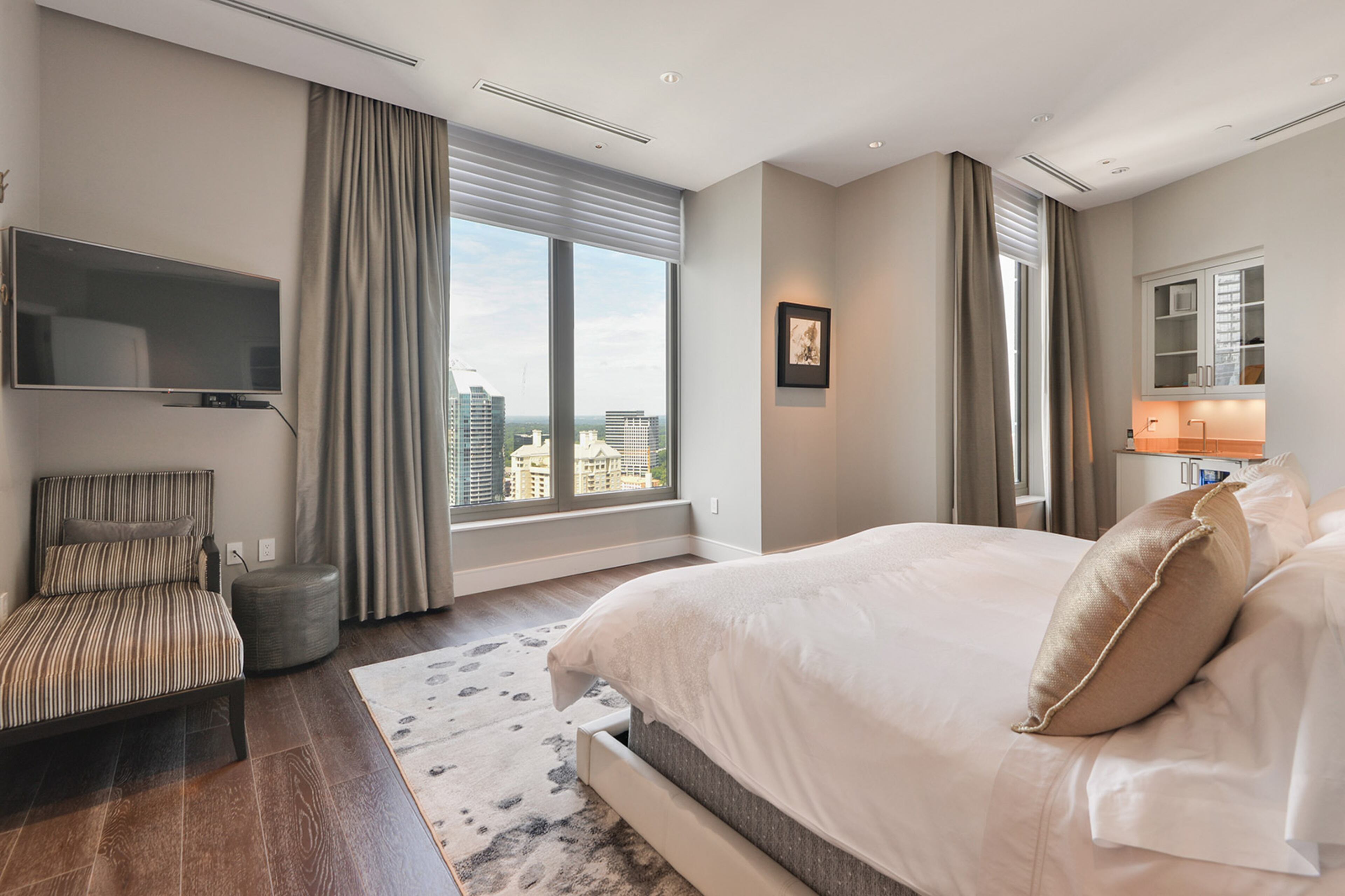 The main bedroom offers a view of Buckhead.