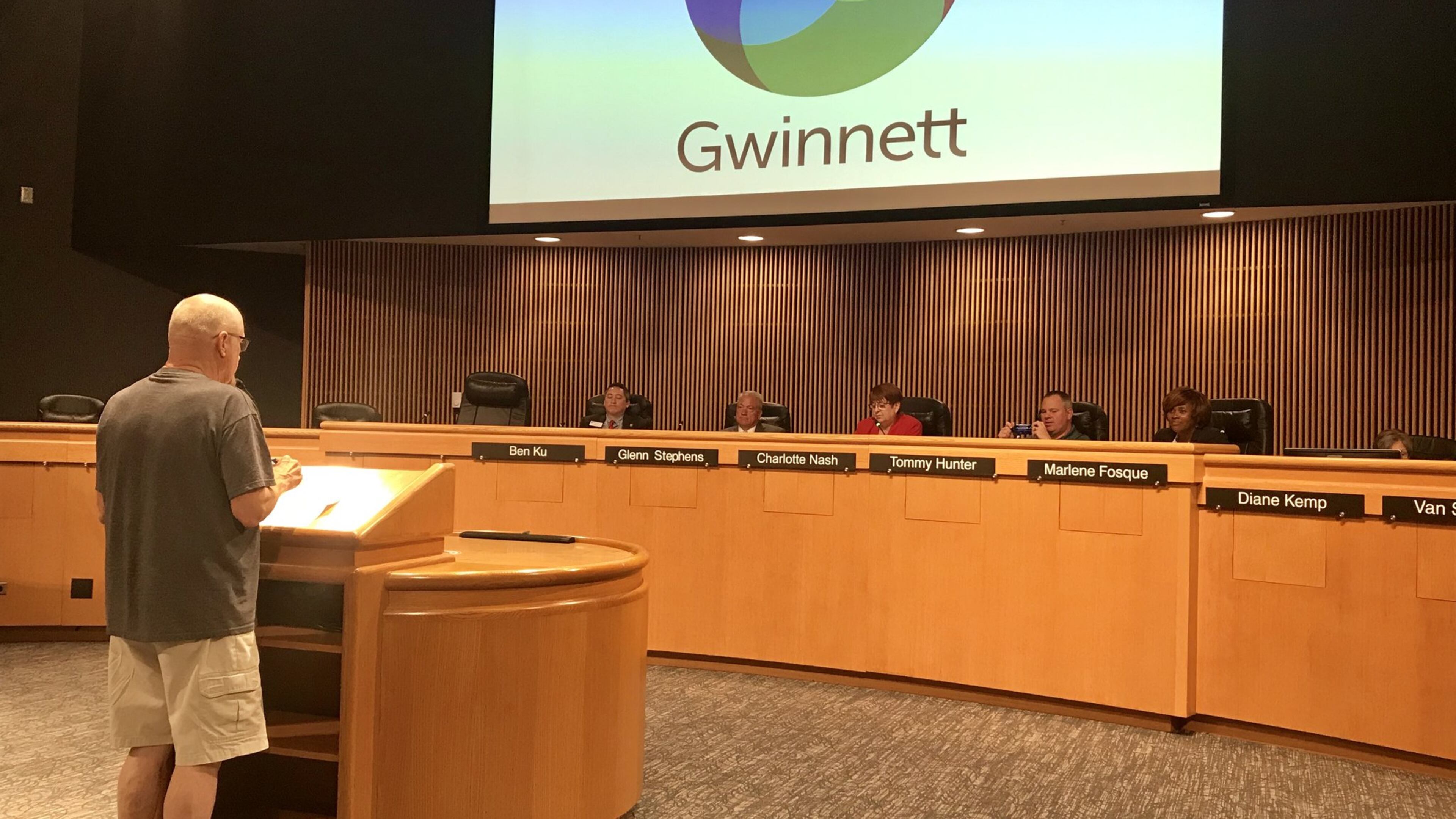 A Gwinnett resident addresses the Board of Commissioners regarding the county’s proposed property tax rate hike on Tuesday afternoon. TYLER ESTEP / TYLER.ESTEP@AJC.COM