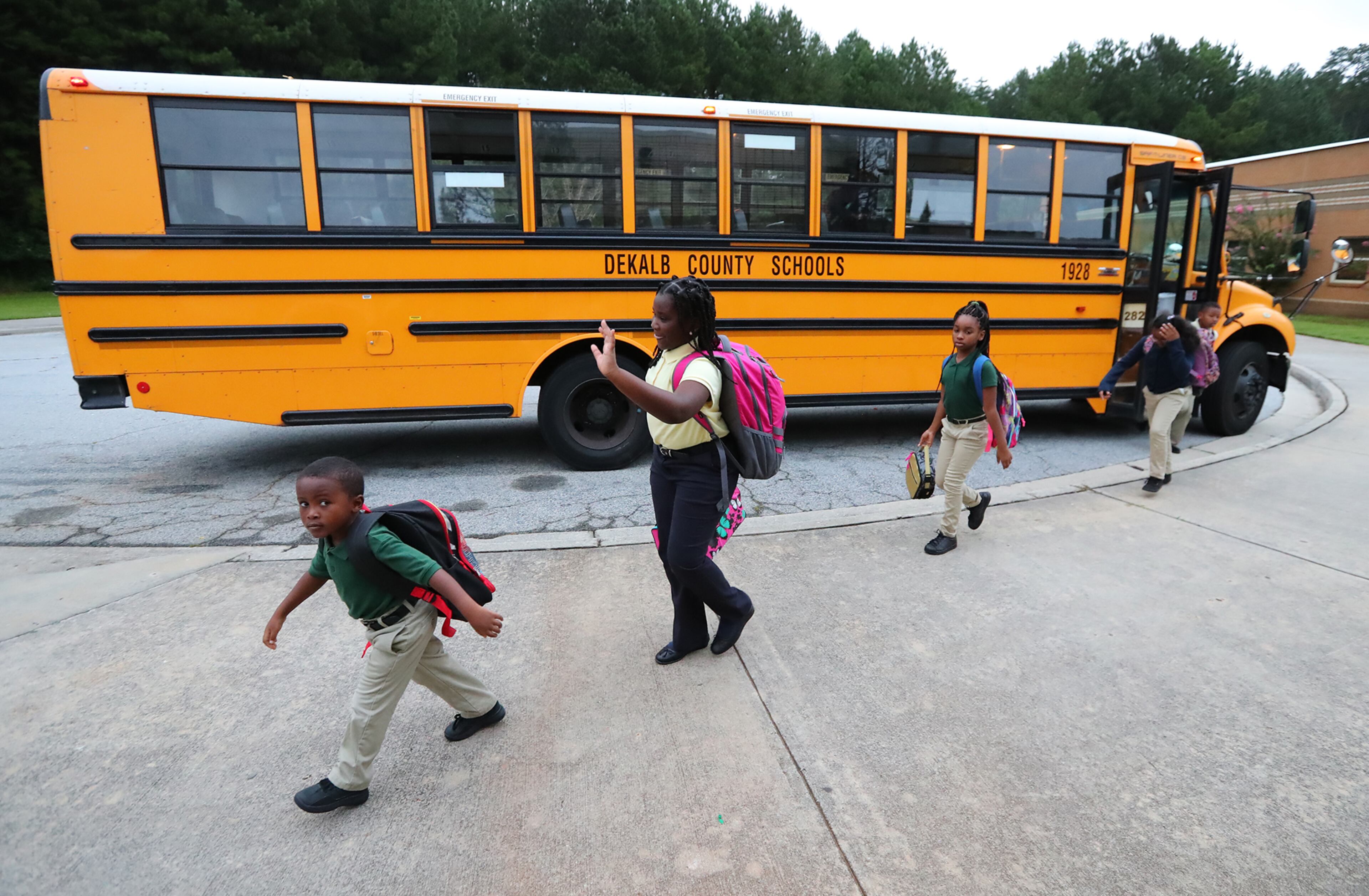August 7, 2017 Lithonia; Fifth grade student Isaiah Brown, 10, enjoys the freedom of an open hallway as he is the first student to arrive for the first day of school at Edward L Bouie Elementary School on Monday, August 7, 2017, in Lithonia. Curtis Compton/ccompton@ajc.com