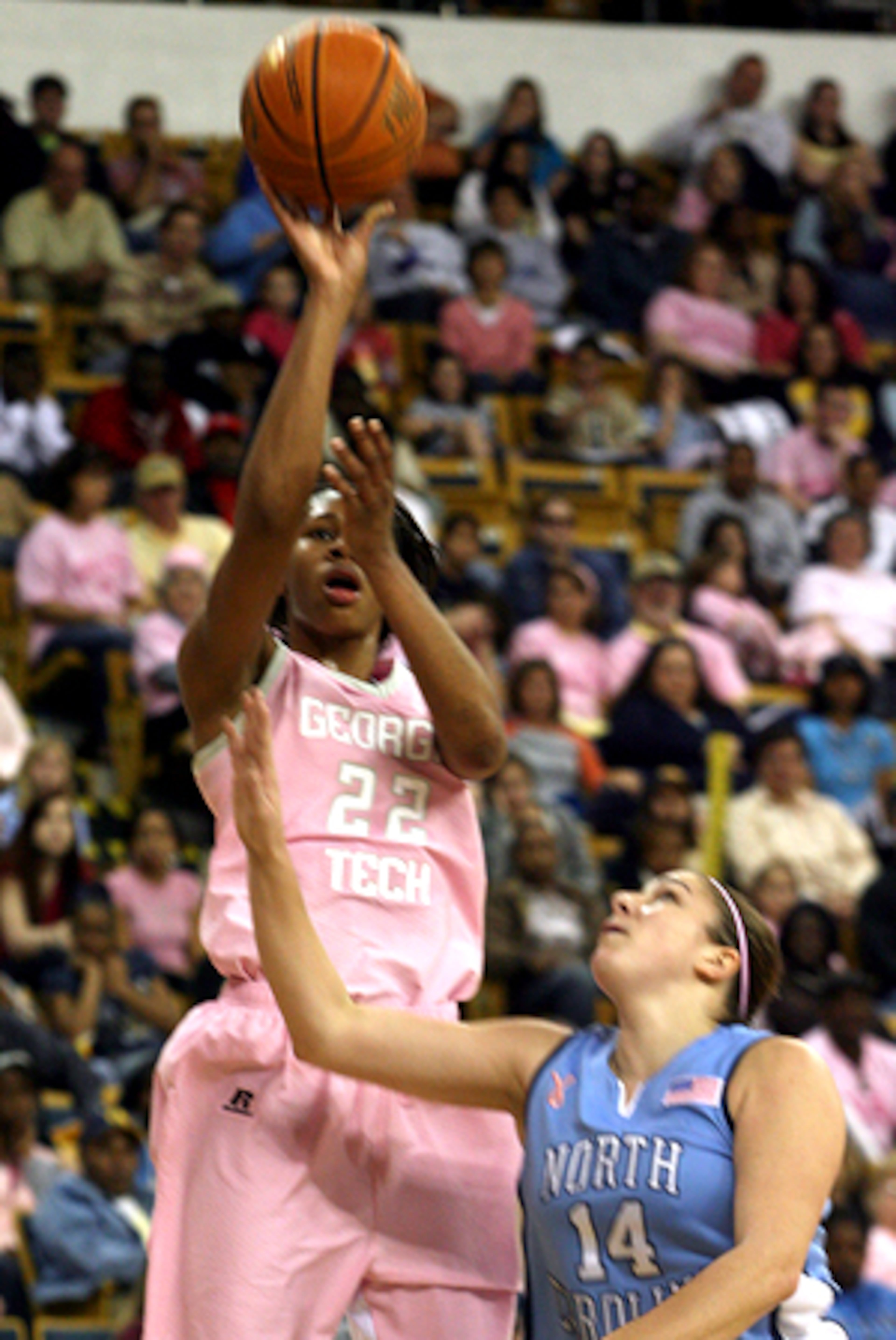 Alex Montgomery of Georgia Tech puts up a shot over the Tar Heels' Heather Claytor.