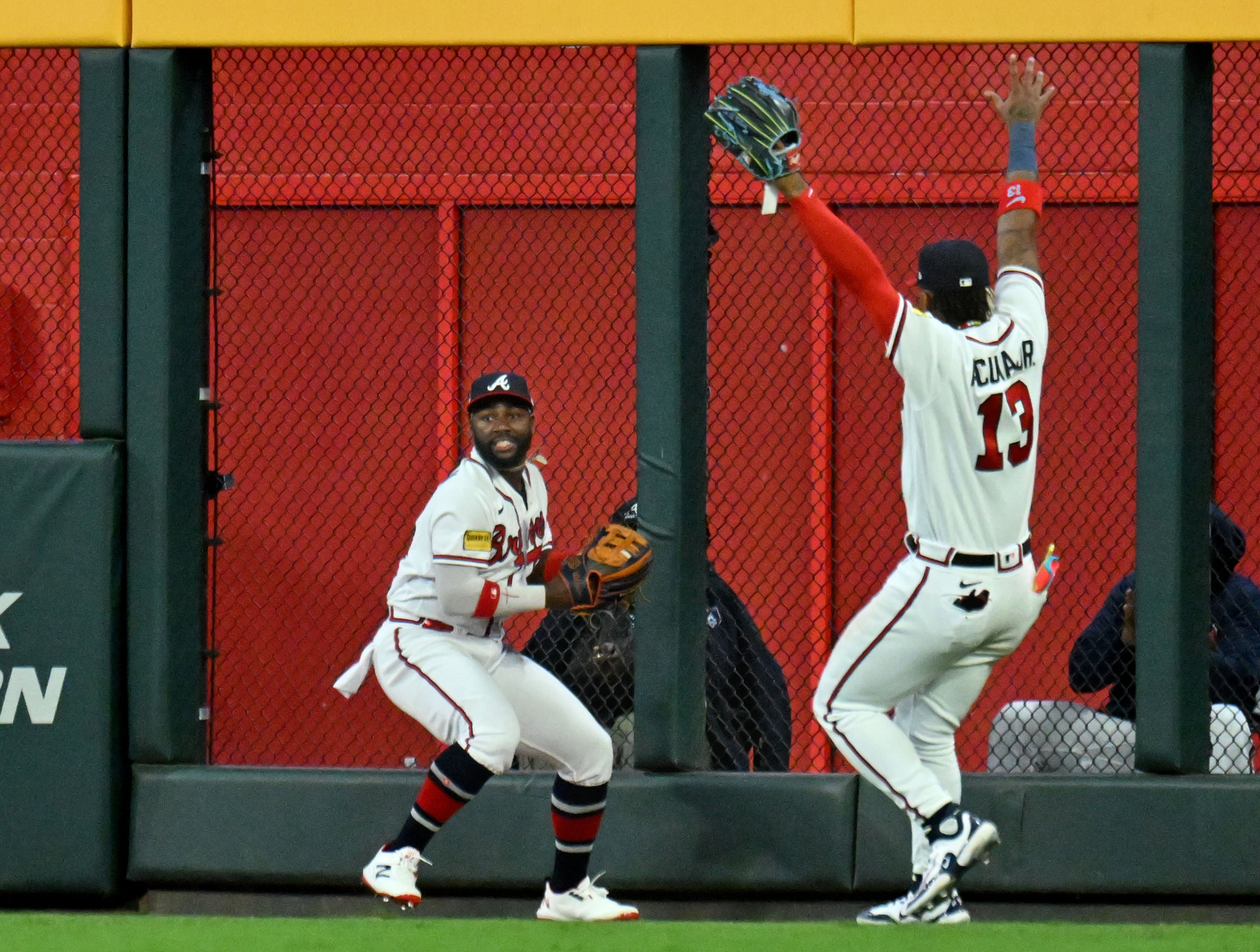 Atlanta Braves center fielder Michael Harris II turns to throw the ball back to the infield. (Hyosub Shin / Hyosub.Shin@ajc.com)