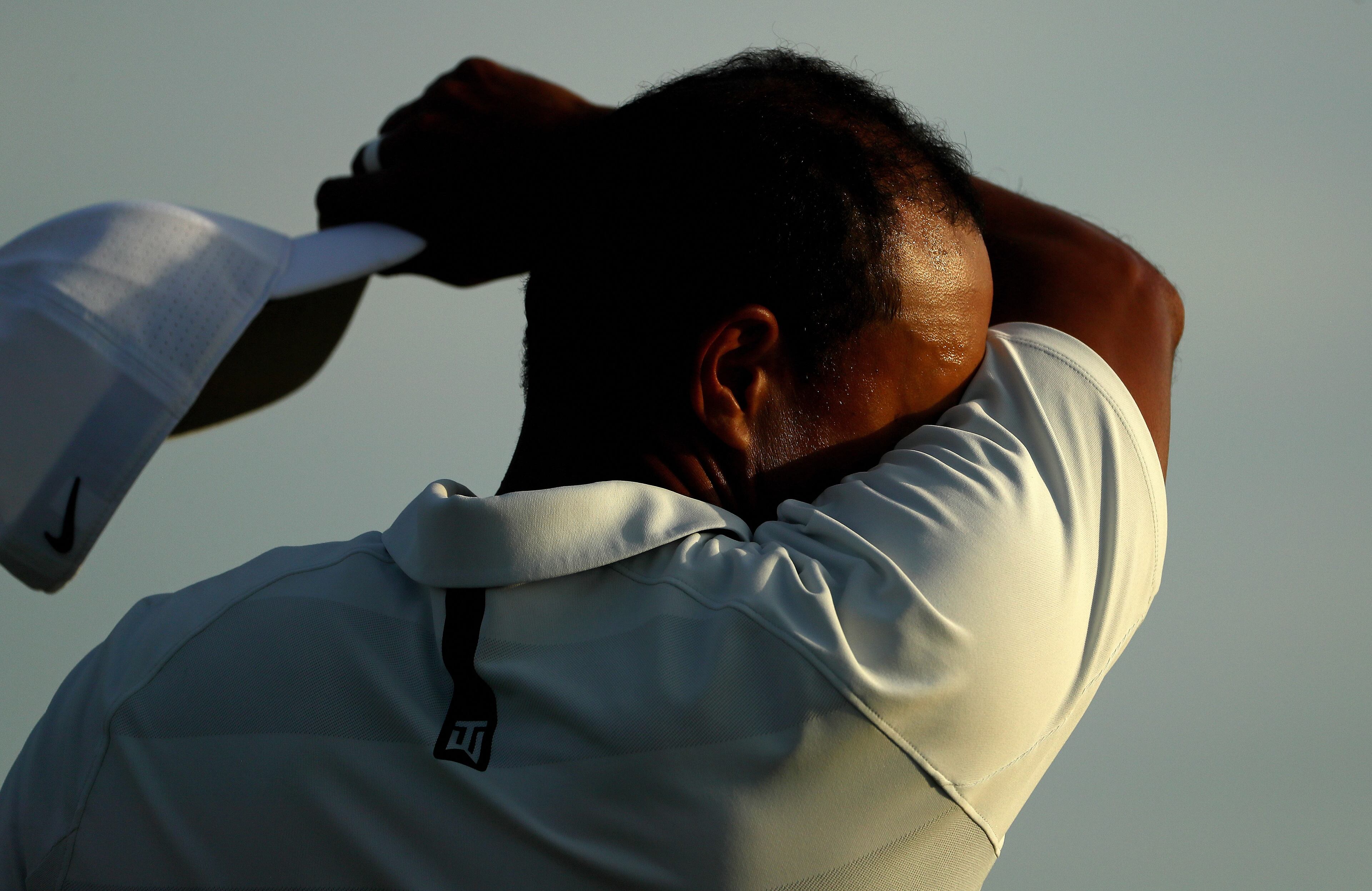 AUGUSTA, GA - APRIL 06: Tiger Woods of the United States reacts on 18th green during the second round of the 2018 Masters Tournament at Augusta National Golf Club on April 6, 2018 in Augusta, Georgia. (Photo by Jamie Squire/Getty Images)
