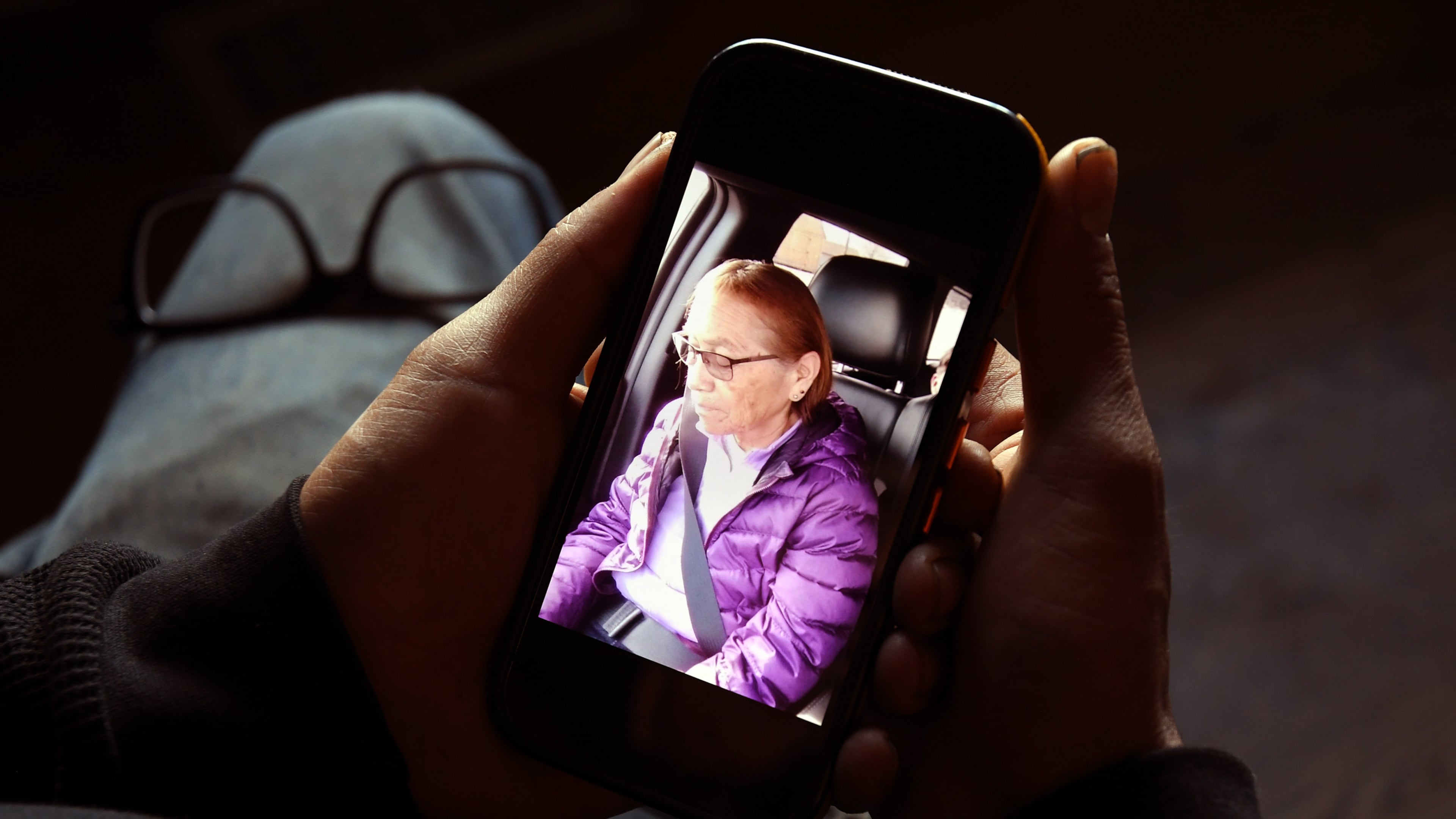 FILE - Gerald Begay, whose mother Ella Mae Begay went missing from her home, shows a photo of her on his phone in Denver, Thursday, April 2, 2026. (AP Photo/Thomas Peipert,File)