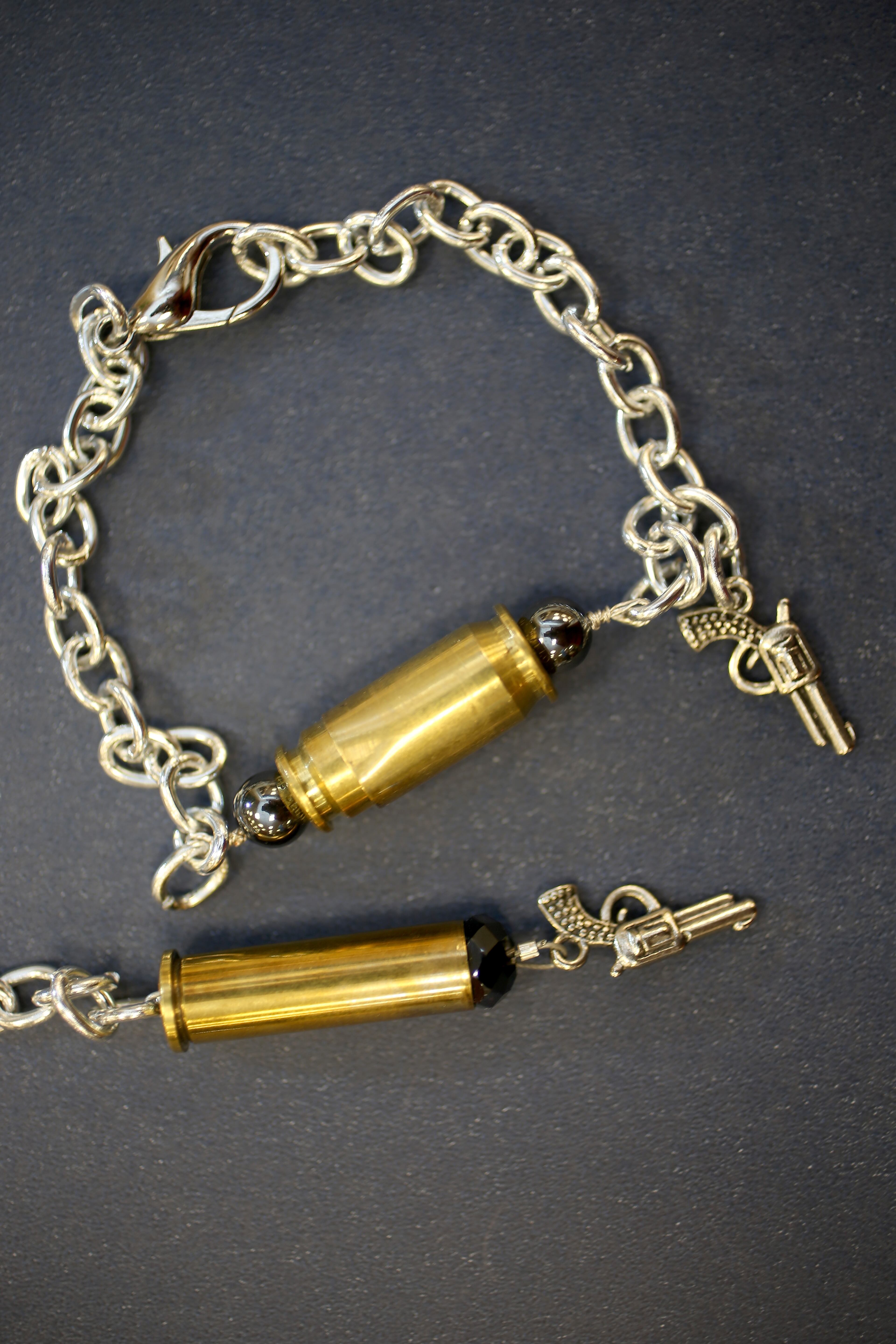 Some of the bracelets, earrings and necklaces available from Gun Girls Inc.