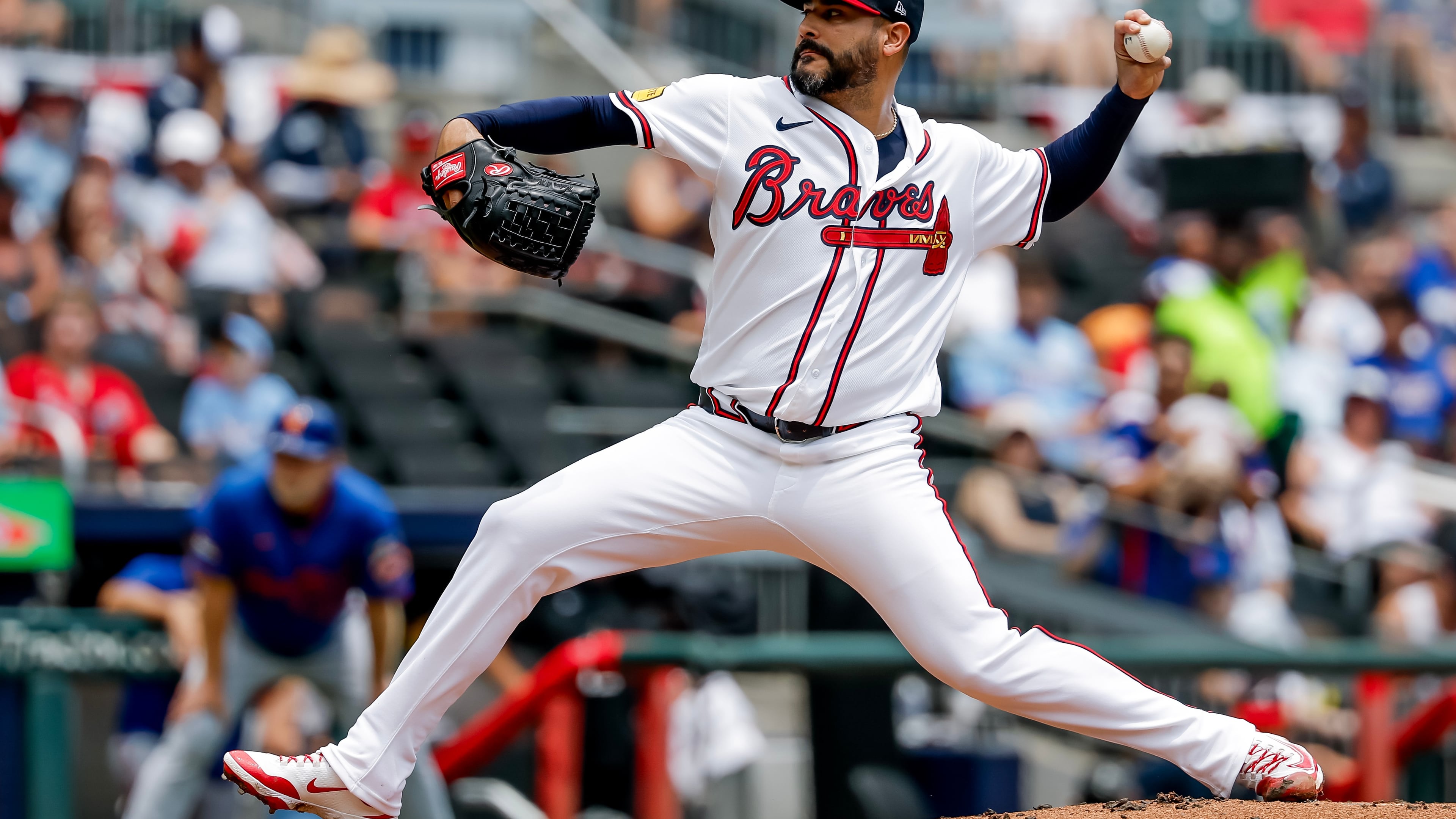 Atlanta Braves pitcher Martín Pérez delivers to a New York Mets batter during the first inning of a baseball game, Sunday, July 5, 2026, in Atlanta. (AP Photo/Erik S. Lesser)