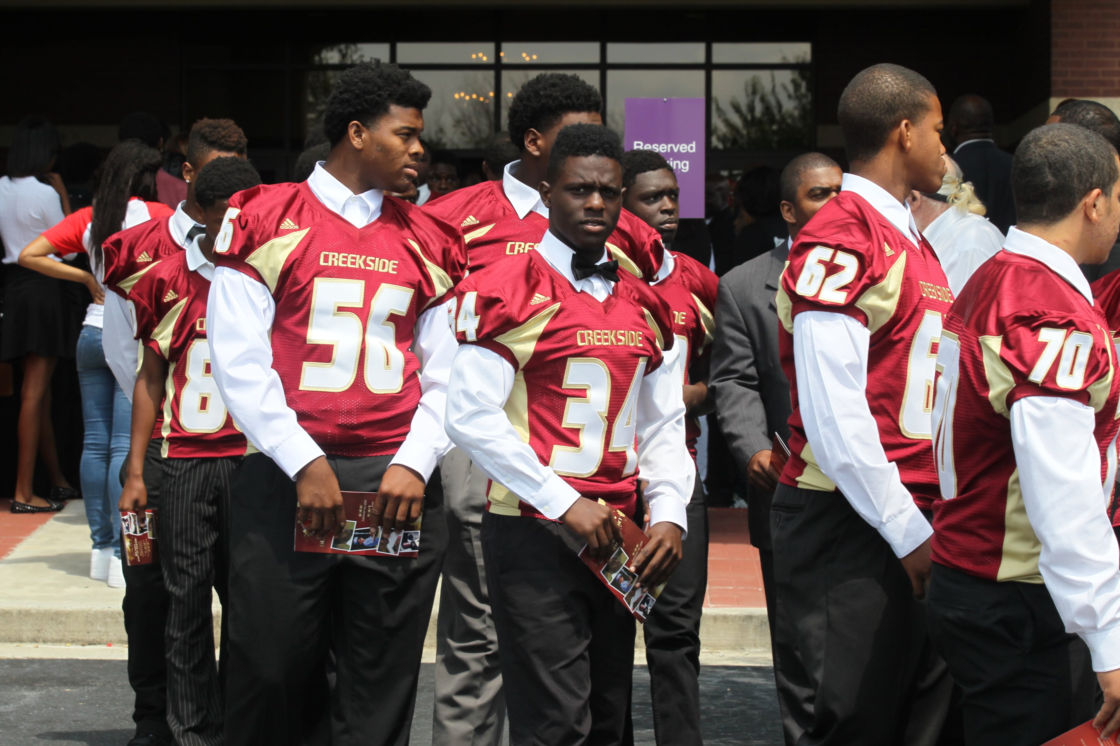 Creekside High School football players after the funeral of the Seminoles cornerback De'Antre Turman who died in a scrimmage Aug. 16.
