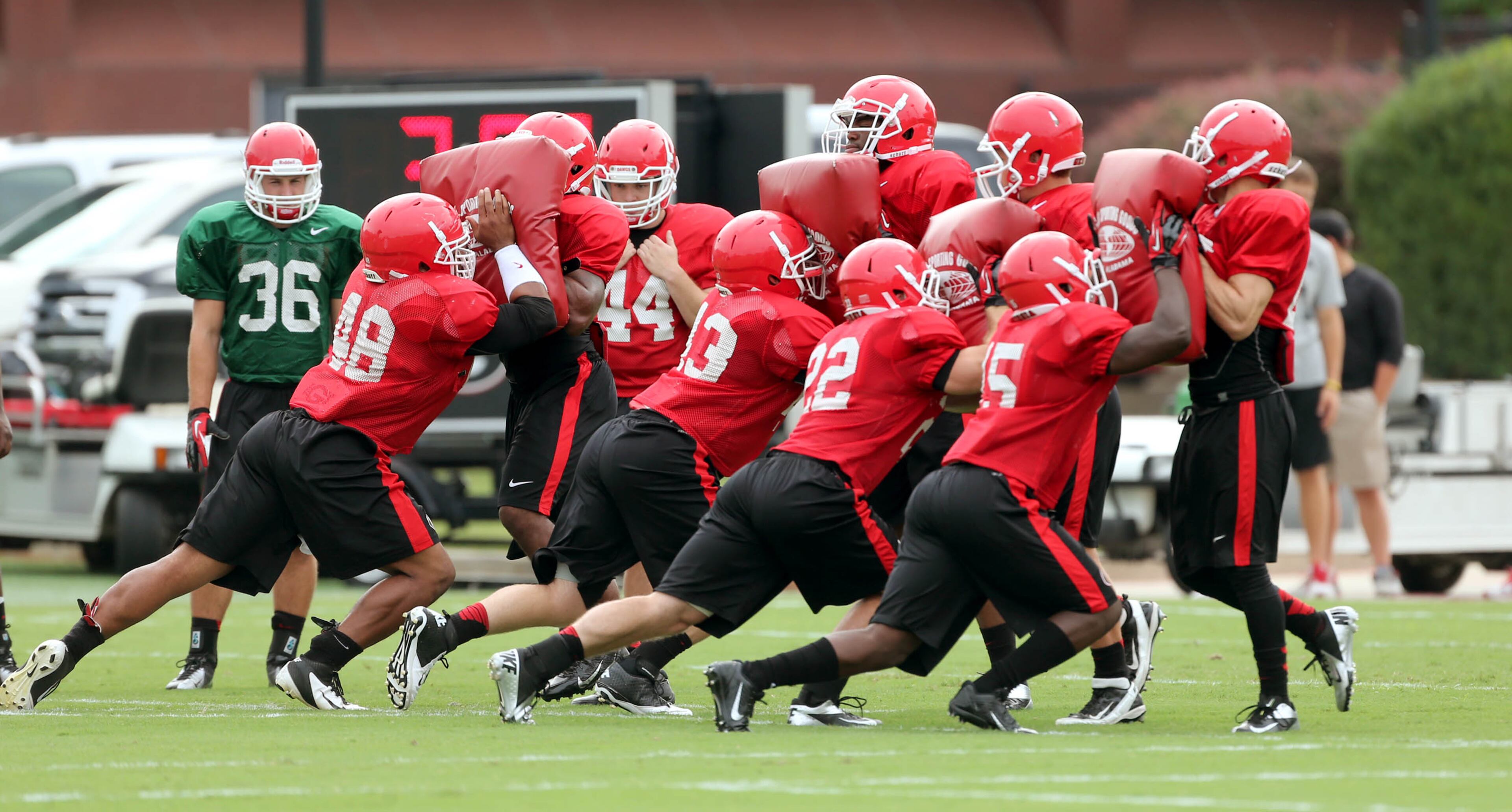 University of Georgia fullbacks and running backs participate in blocking drills during preseason football practice at the University of Georgia Thursday afternoon in Athens, Ga., August 15, 2013. JASON GETZ / JGETZ@AJC.COM