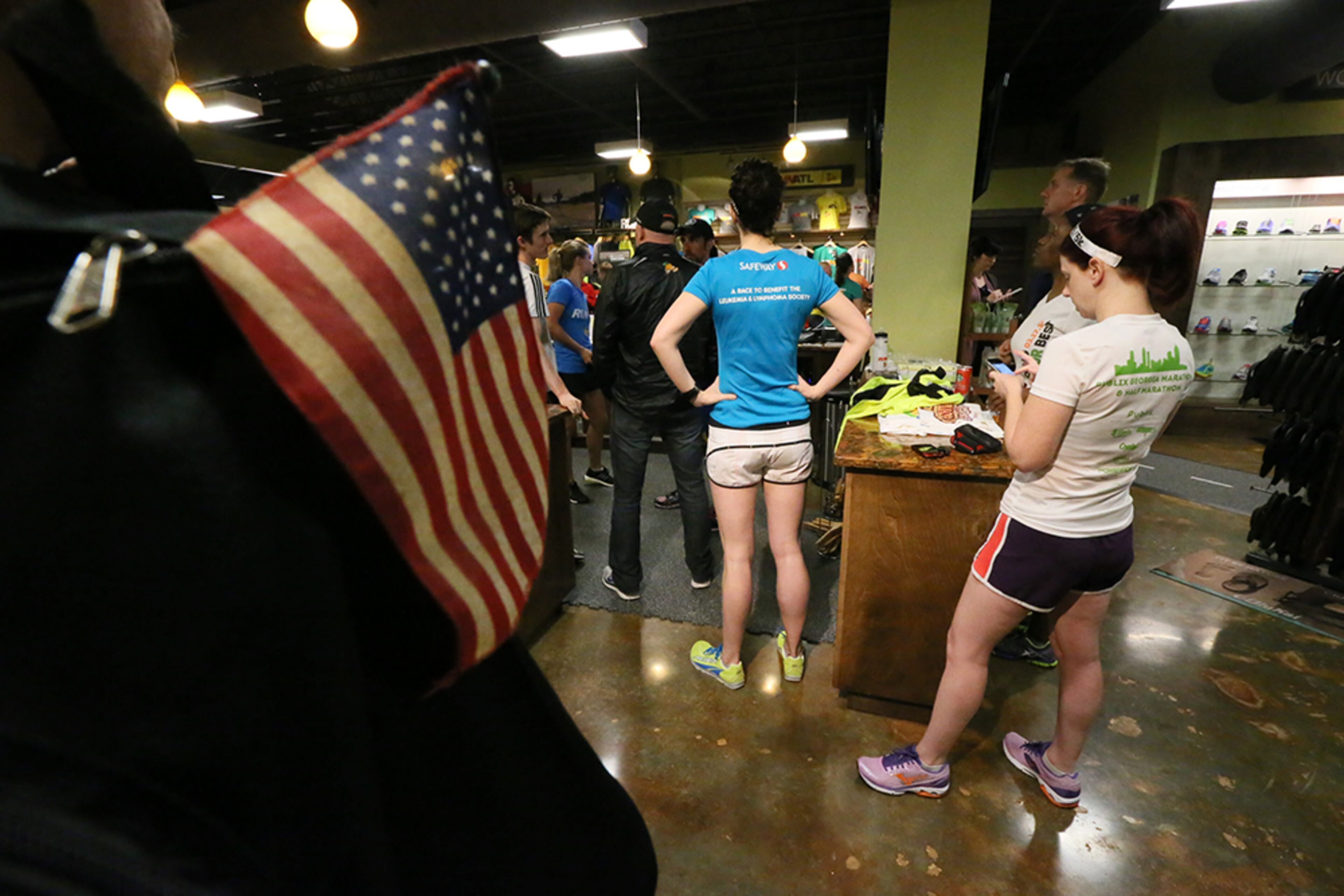 Runners gathered Tuesday morning at the Big Peach Running Co. in Midtown for a "Mile Of Silence" group run/walk in honor of the victims of Monday's bombings at the Boston Marathon.