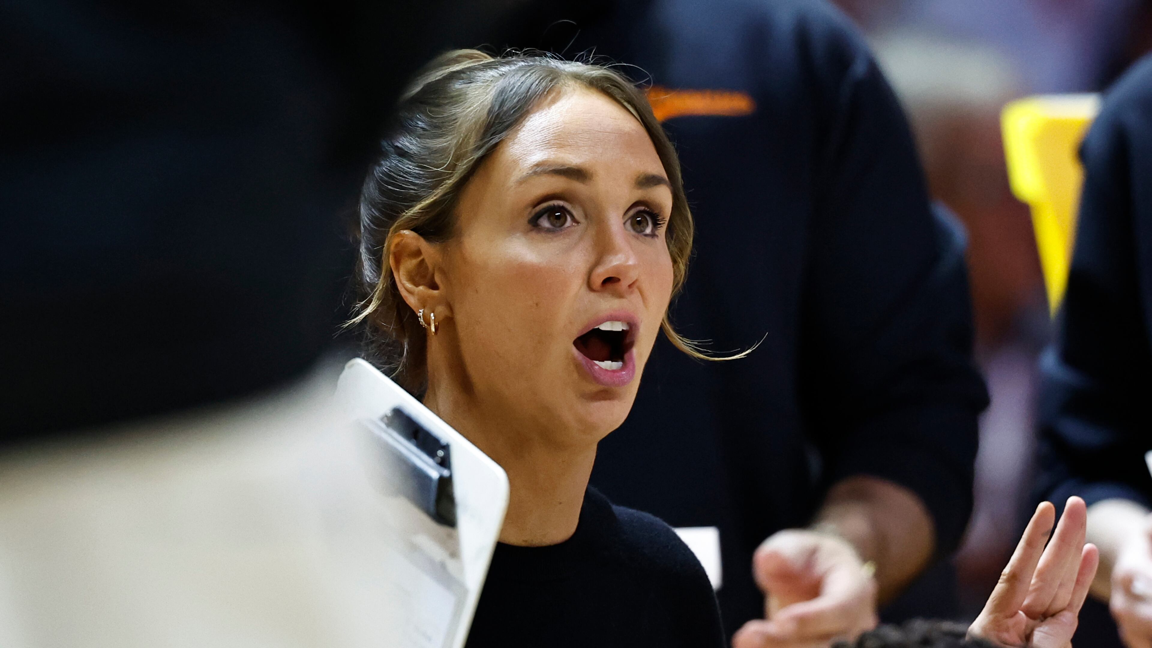 Tennessee head coach Kim Caldwell talks to her players during a timeout in the first half of an NCAA college basketball game against Vanderbilt in Knoxville, Tenn., Sunday, March 1, 2026. (AP Photo/Wade Payne)