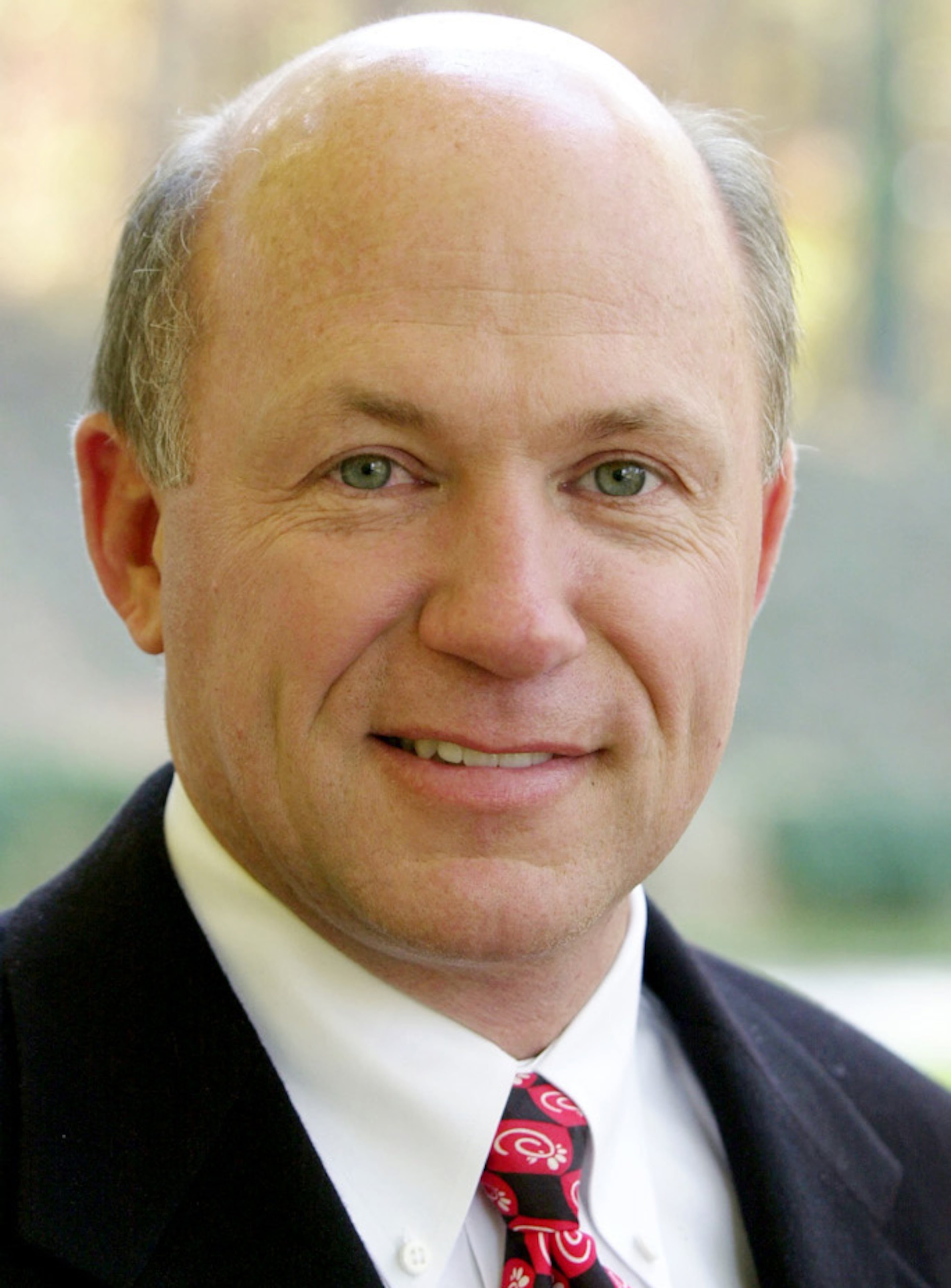 ADVANCE FOR WEEKEND EDITIONS OF NOV. 17-18-- Chick-fil-A founder S. Truett Cathy, top left, his son Donald 'Bubba' Cathy, top right, his son, Dan T. Cathy, bottom left, and his daughter, Trudy White, bottom right, are seen Thursday, Nov. 8, 2001, at the Chick-fil-A headquarters in south Atlanta. (AP Photo/Ric Feld)
