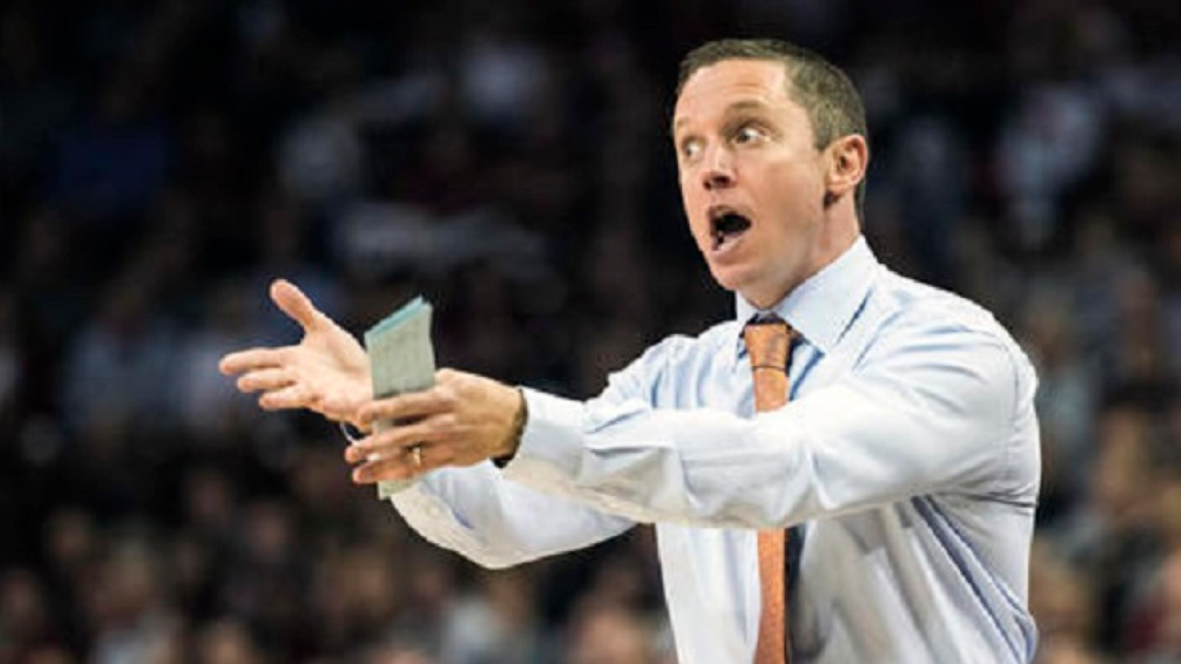 Florida head coach Mike White communicates with players during the first half of an NCAA college basketball game against South Carolina Wednesday, Jan. 18, 2017, in Columbia, S.C. (AP Photo/Sean Rayford)