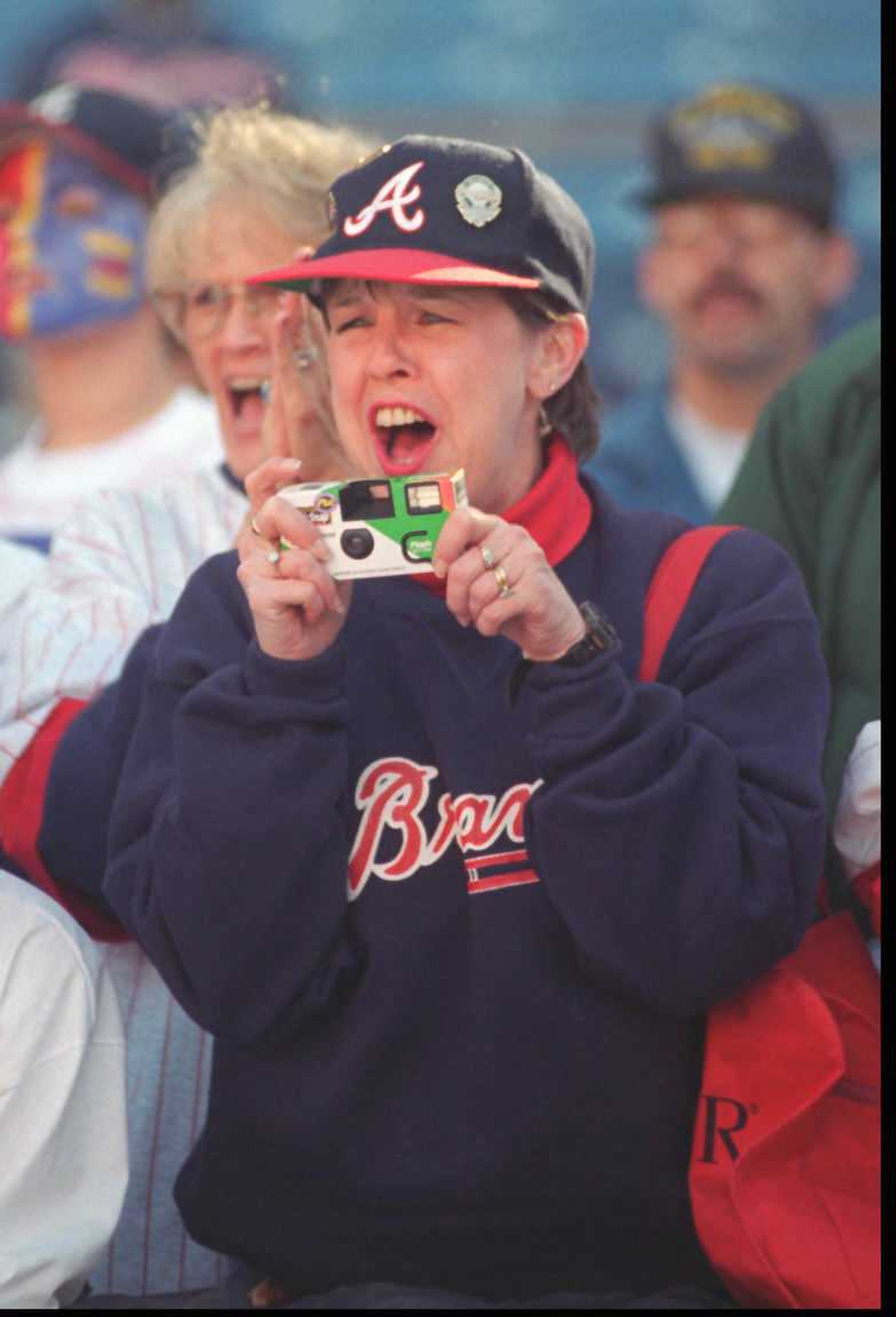 OCTOBER 21, 1995 ATLANTA Sandy Bowling of Florence, Ala. yells for her favorite Braves as they come out prior to the start of Game One. MARLENE KARAS/AJC STAFF
