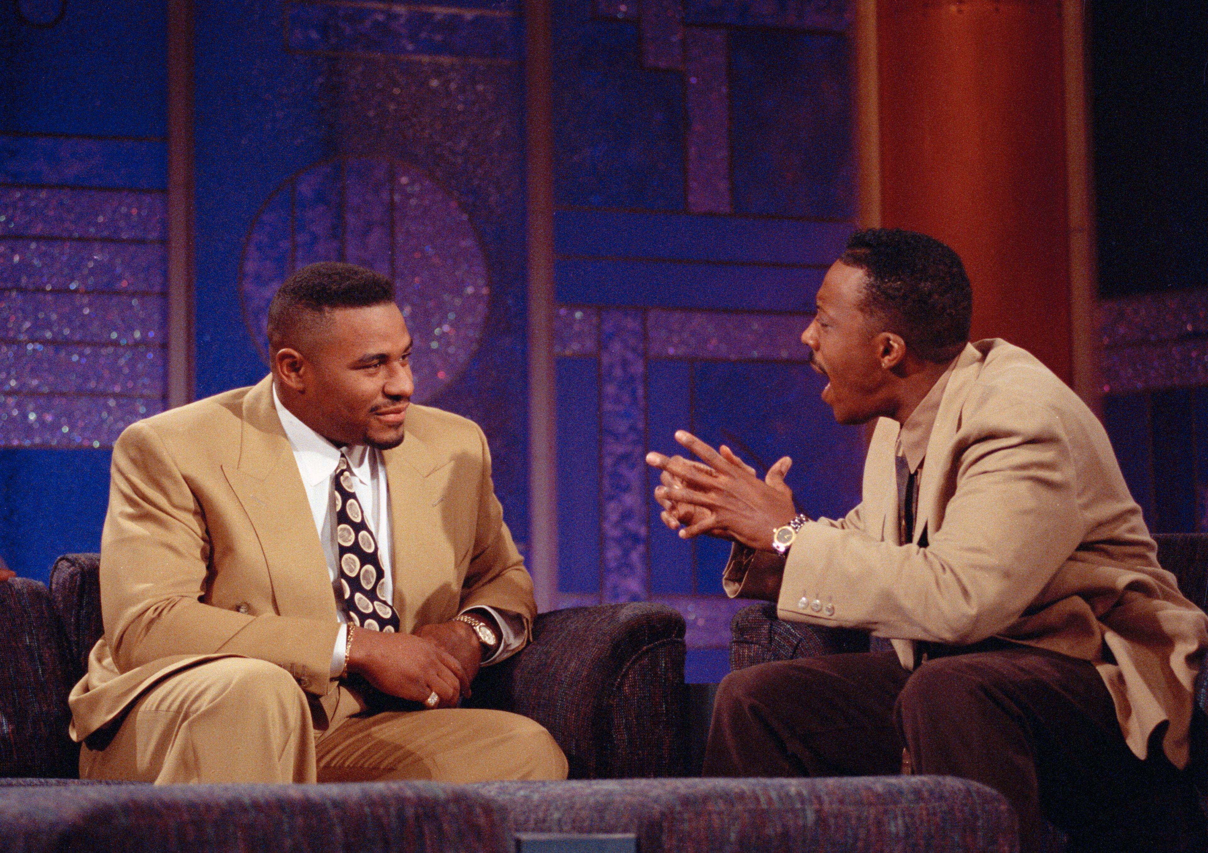 Jerome Bettis, left, tailback for the Los Angeles Rams and AP Offensive Rookie of the Year, talks with Arsenio Hall on the "Arsenio Hall Show", Jan. 11, 1994, in Los Angeles.