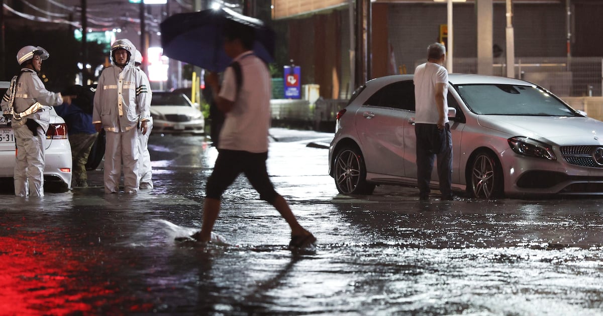 Heavy rain causes flooding near Tokyo that kills 4 and disrupts train and air travel