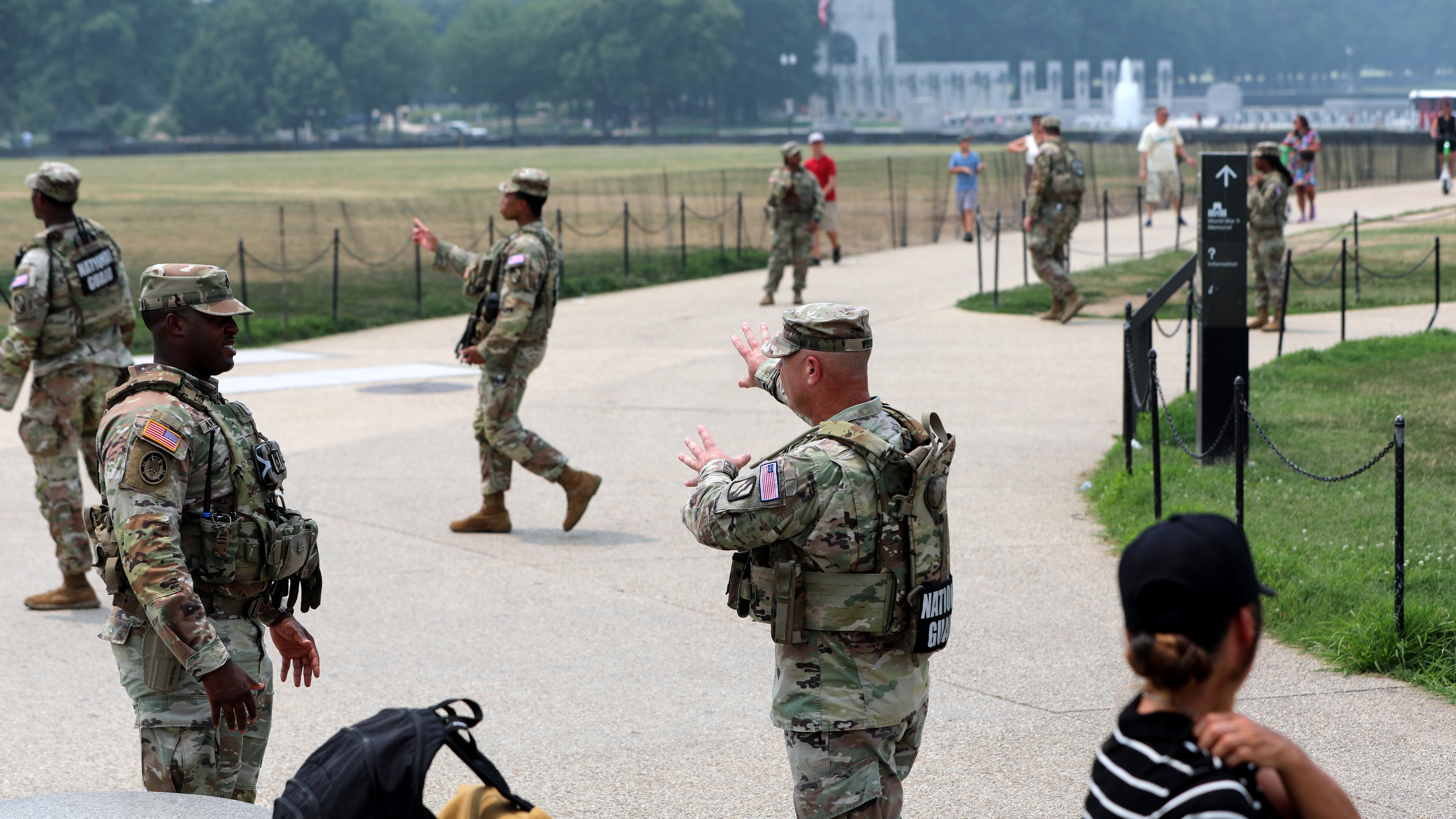 Members of the National Guard patrol around the Washington Monument, before Marine One, with President Donald Trump aboard, departs near the White House, Friday, July 17, 2026, in Washington. (AP Photo/Rahmat Gul)