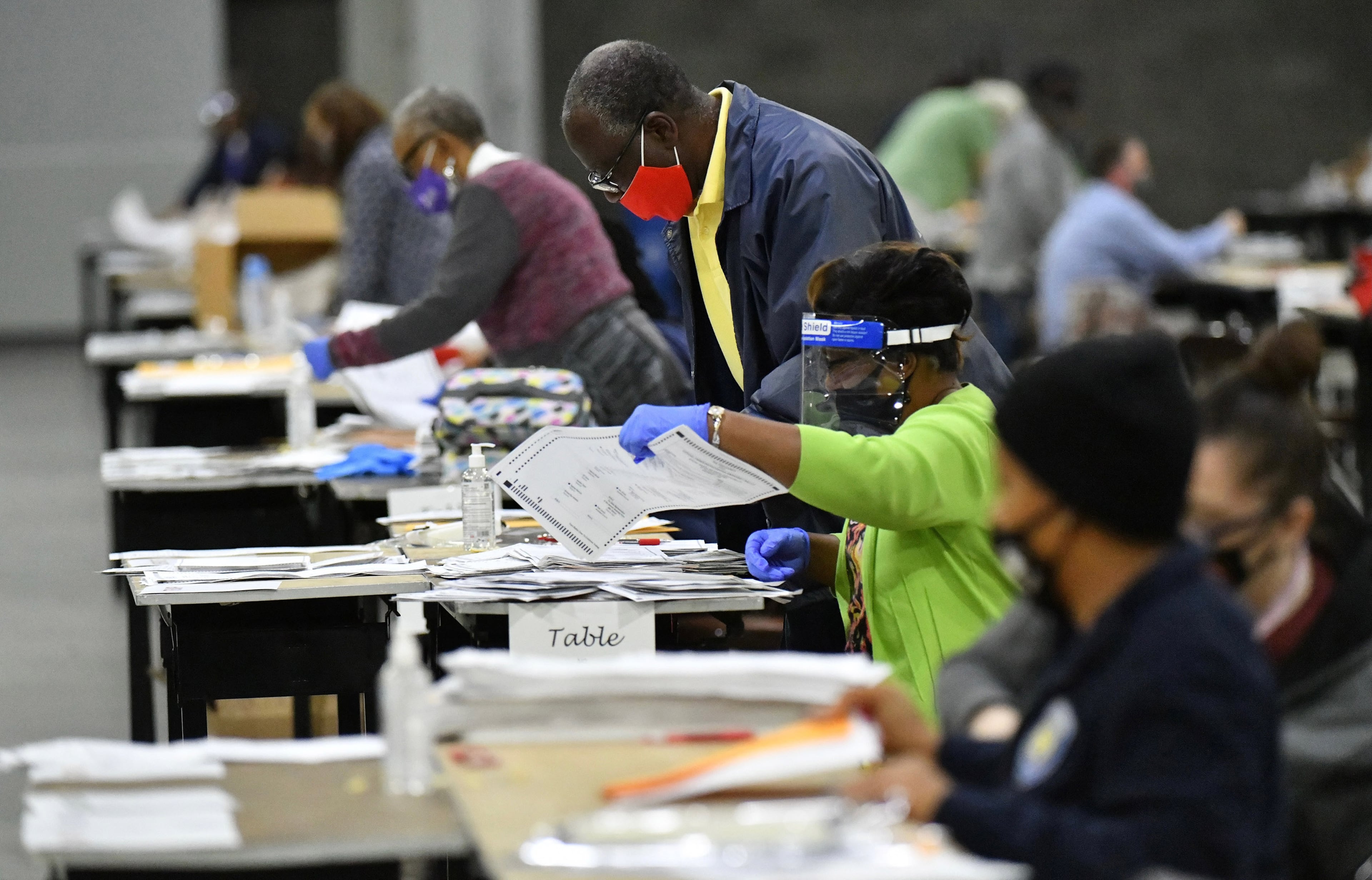Election workers in Fulton County during a recount of ballots in Atlanta, Georgia on Saturday, Nov. 14, 2020. (Hyosub Shin/AJC)