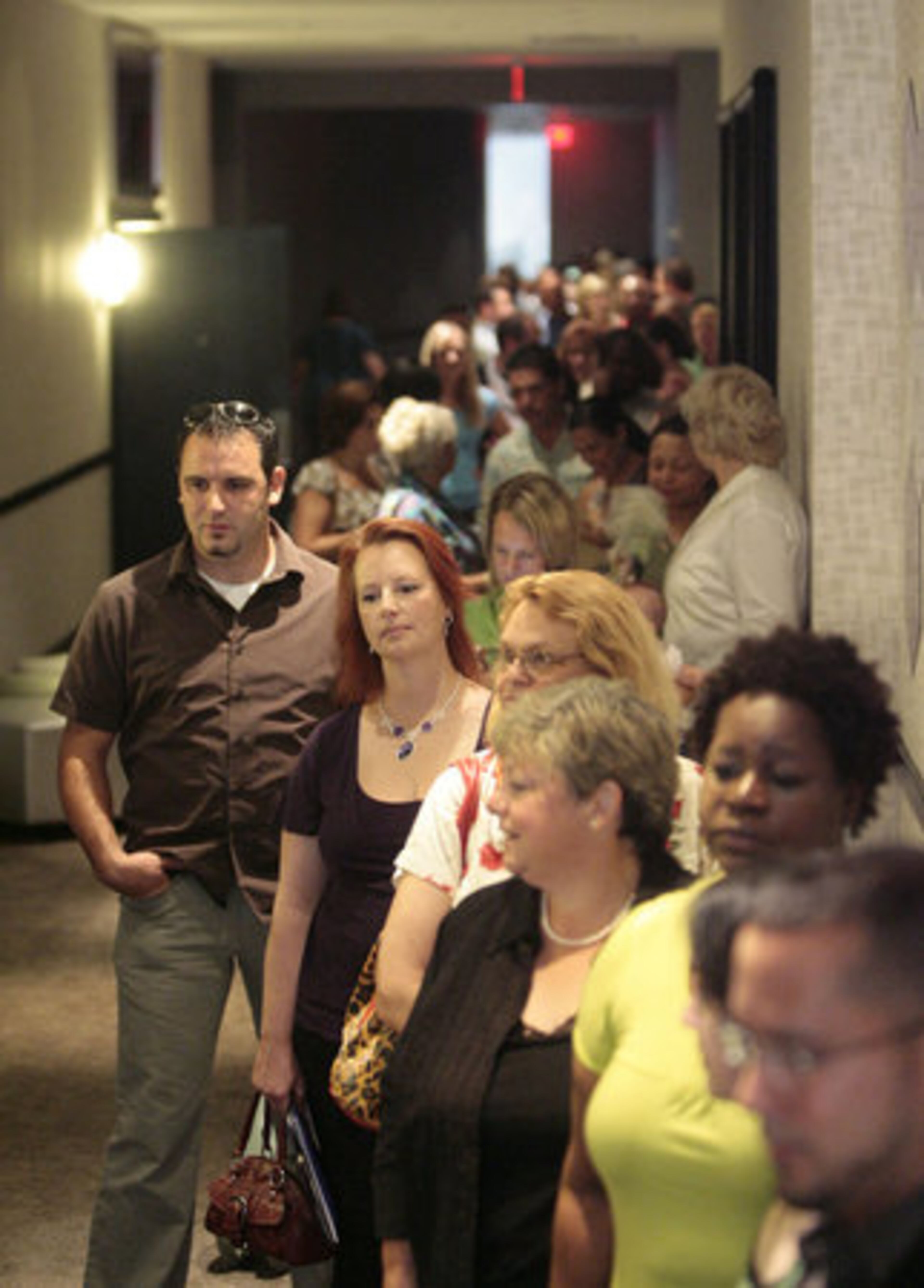 The line to sign in filled the hall, with about an hour's wait to sign in for an interview slot.