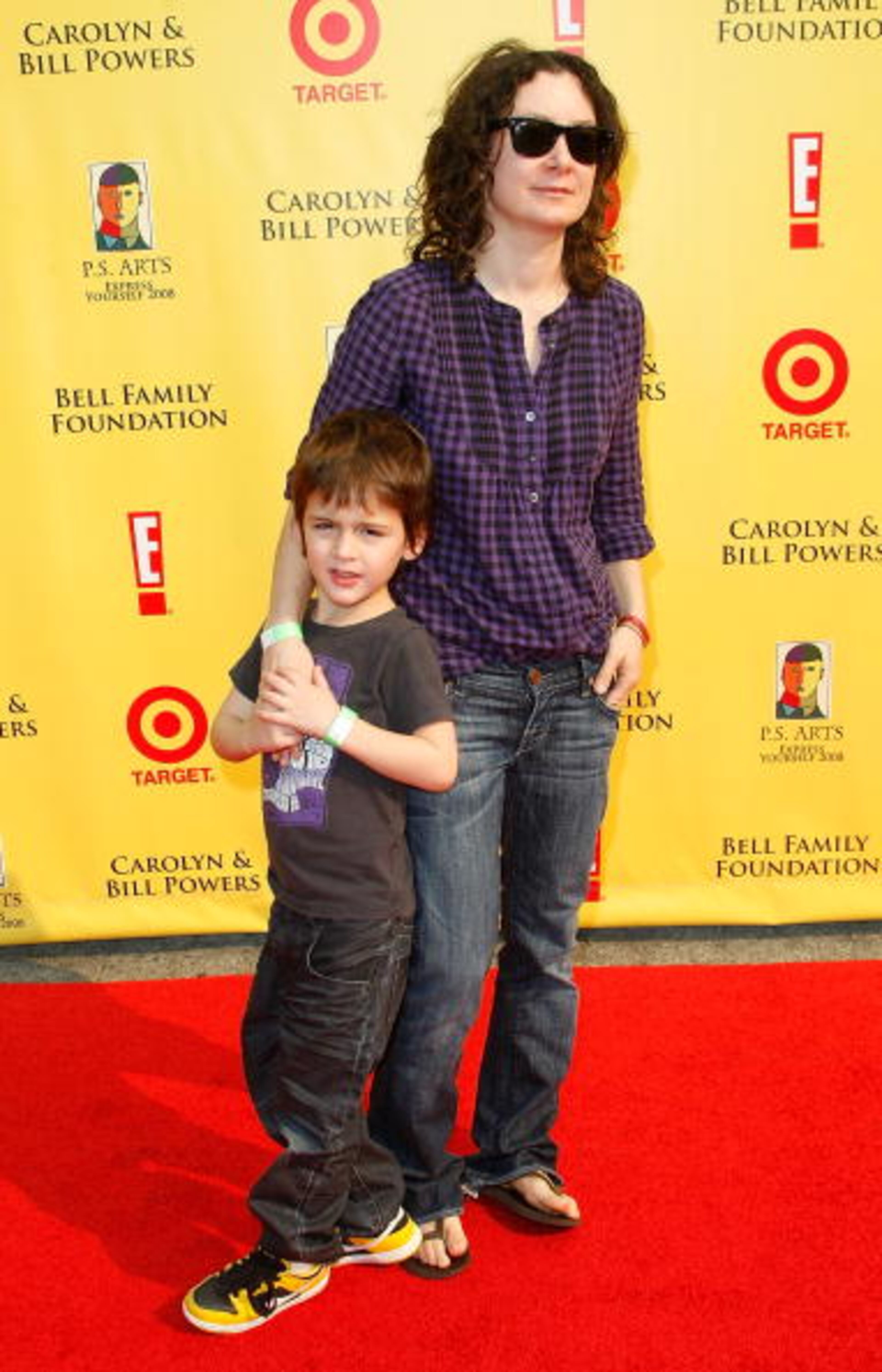 SANTA MONICA, CA - NOVEMBER 16: Actress Sara Gilbert (R) and son Levi Hank Gilbert-Adler arrives at the P.S. Arts "Express Yourself 2008" at Barker Hanger on November 16, 2008 in Santa Monica, California. (Photo by Michael Buckner/Getty Images)