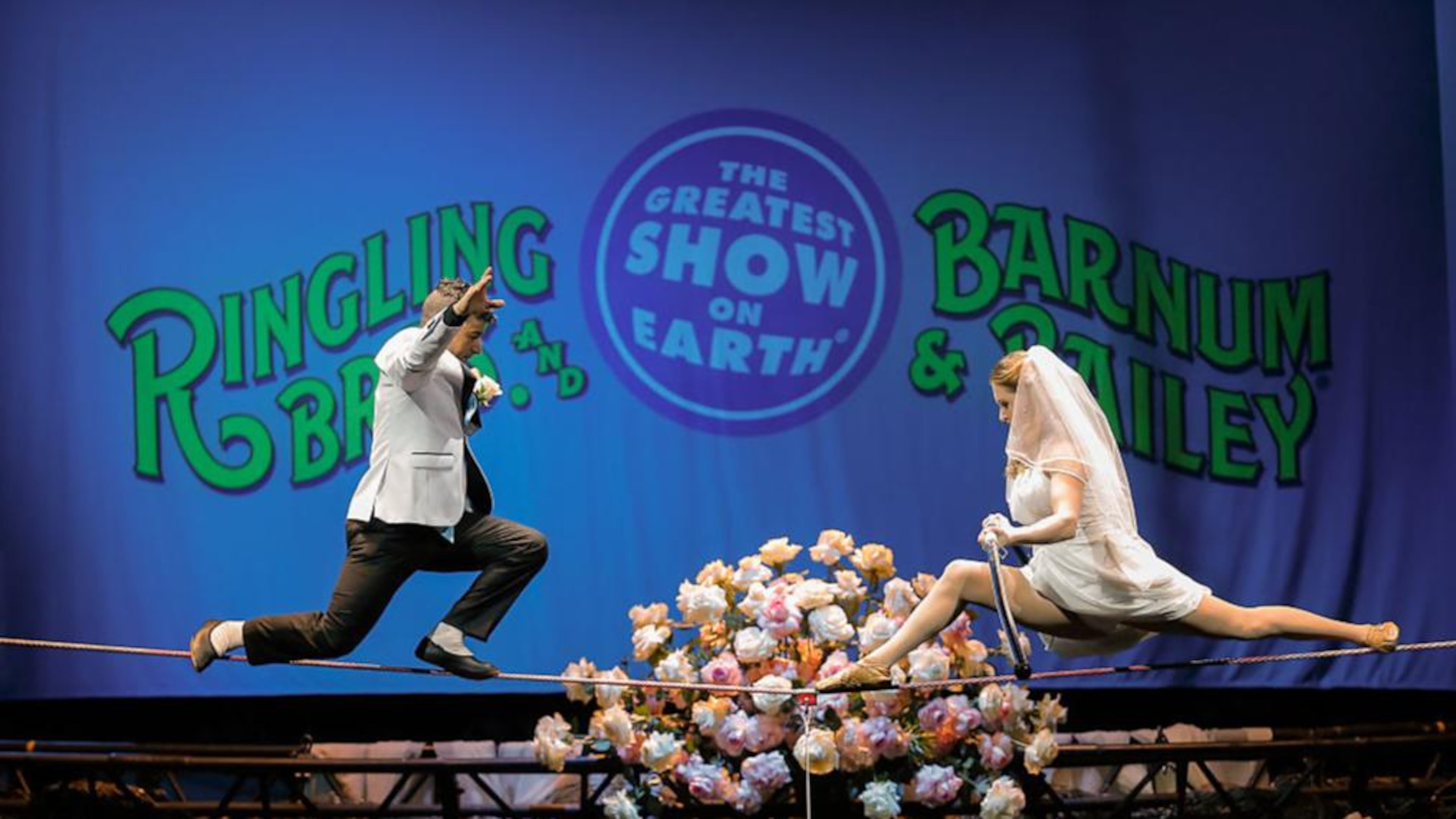XTREME High Wire Walkers Mustafa Danguir and Anna Lebedeva, of Ringling Bros. and Barnum & Bailey, exchange wedding vows 30 feet above the NRG Stadium floor in 2016 in Houston. Four years after the “Greatest Show On Earth” shut down, officials are planning to bring back the Ringling Bros. and Barnum & Bailey Circus — without animal acts. (Photo by Bob Levey/for Feld Entertainment)